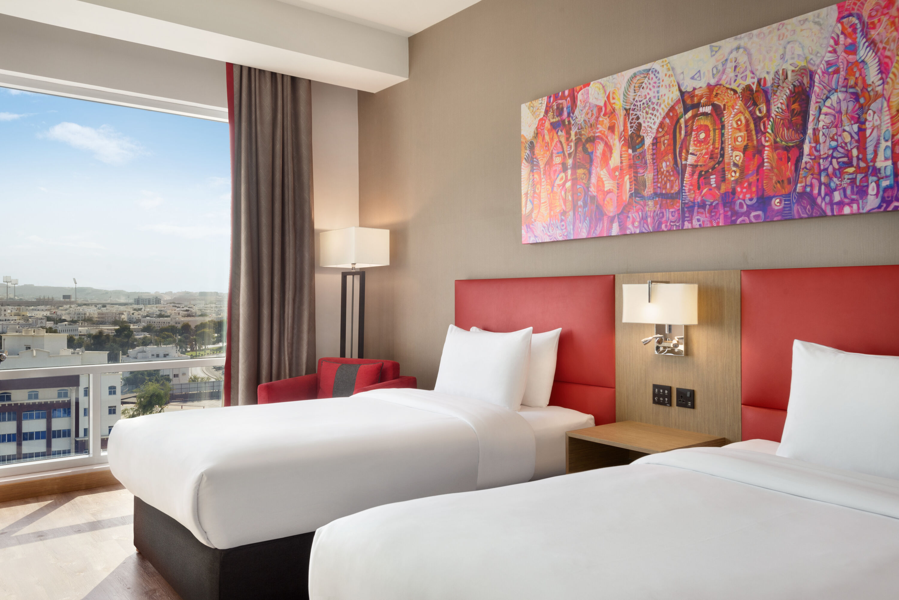 Guest room at the Ramada Encore by Wyndham Muscat Al-Ghubra in Muscat, Other than US/Canada