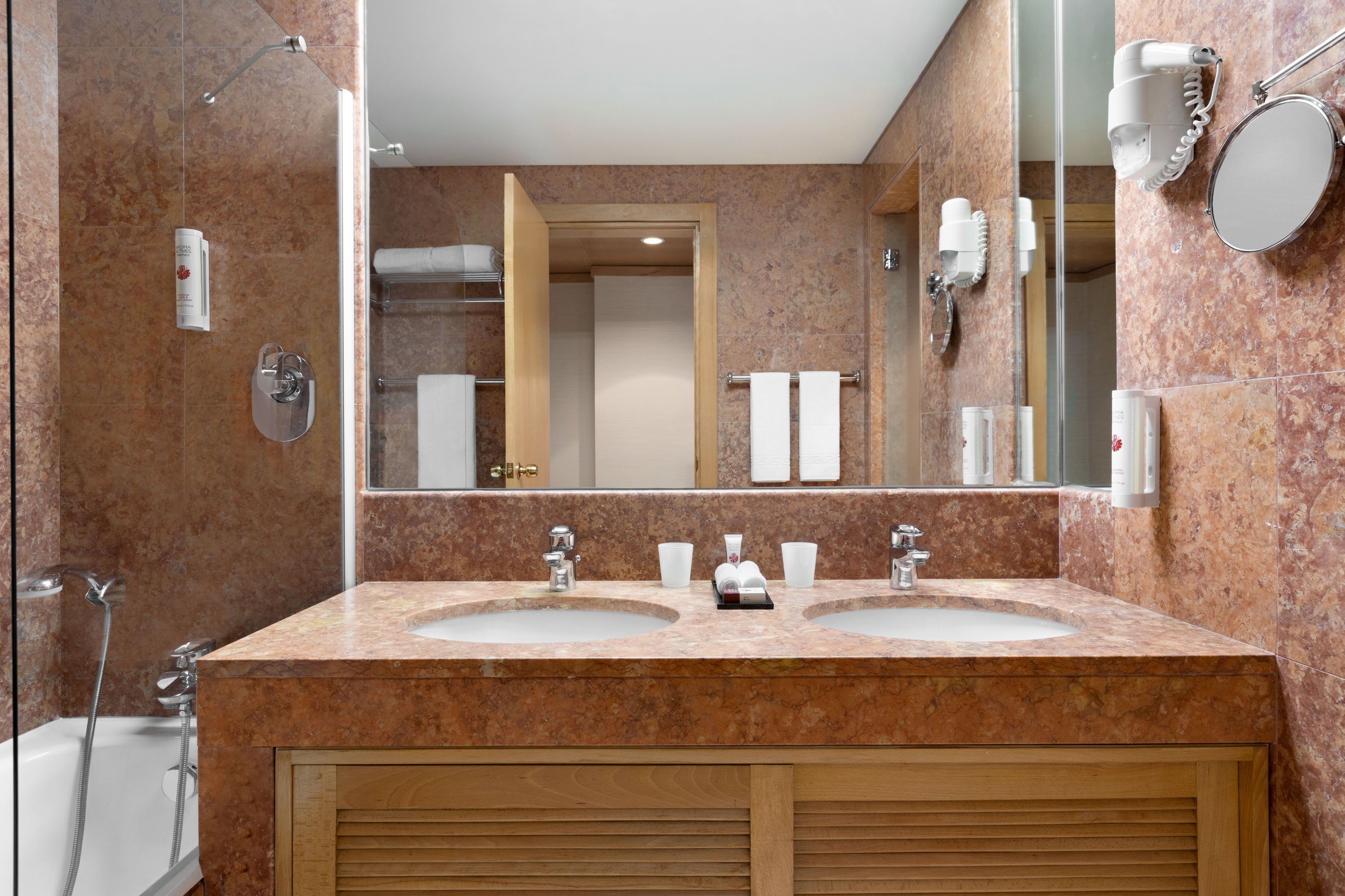 Guest room bath at the Ramada by Wyndham Lisbon in Lisbon, Other than US/Canada