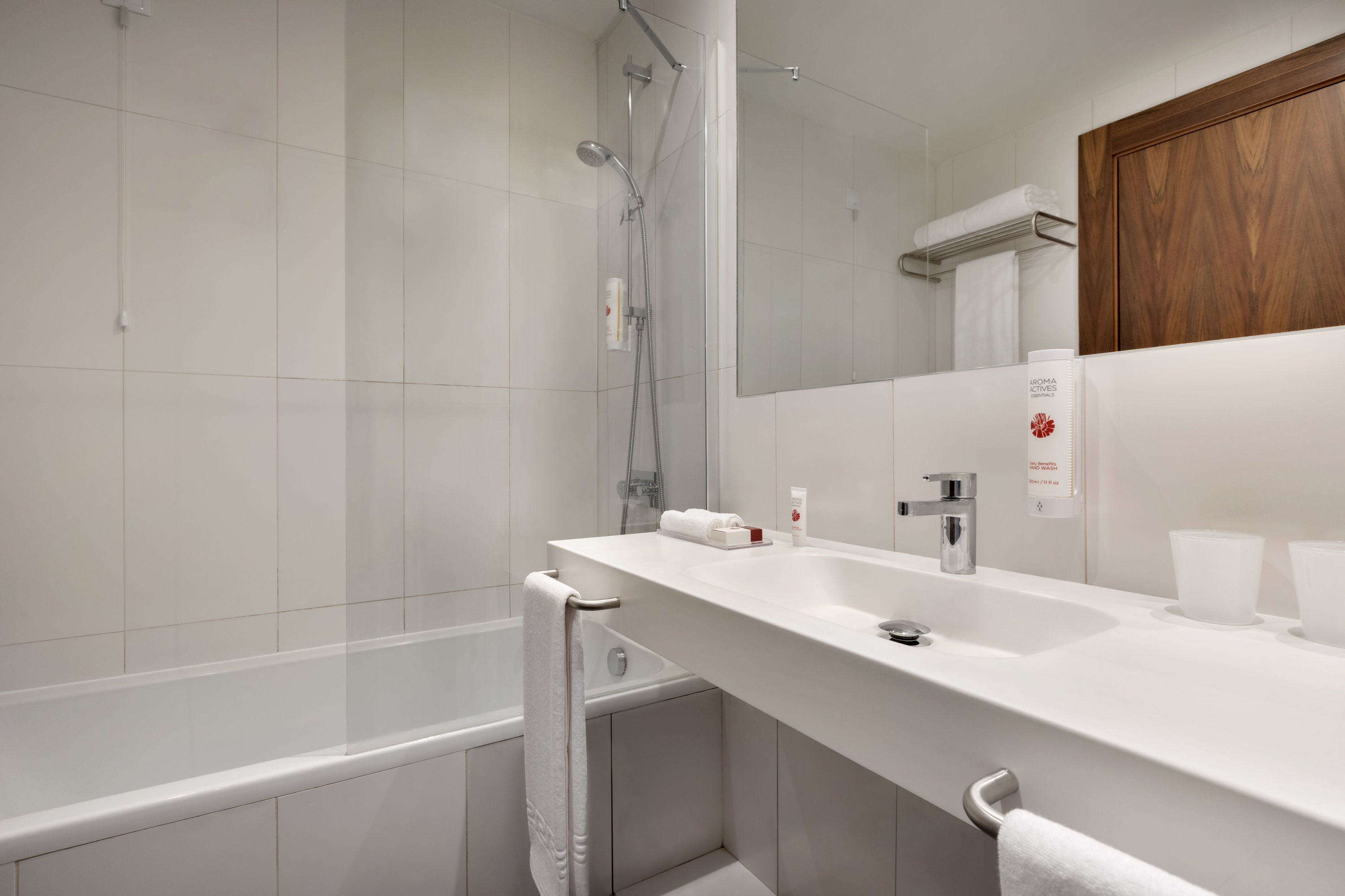 Guest room bath at the Ramada by Wyndham Lisbon in Lisbon, Other than US/Canada