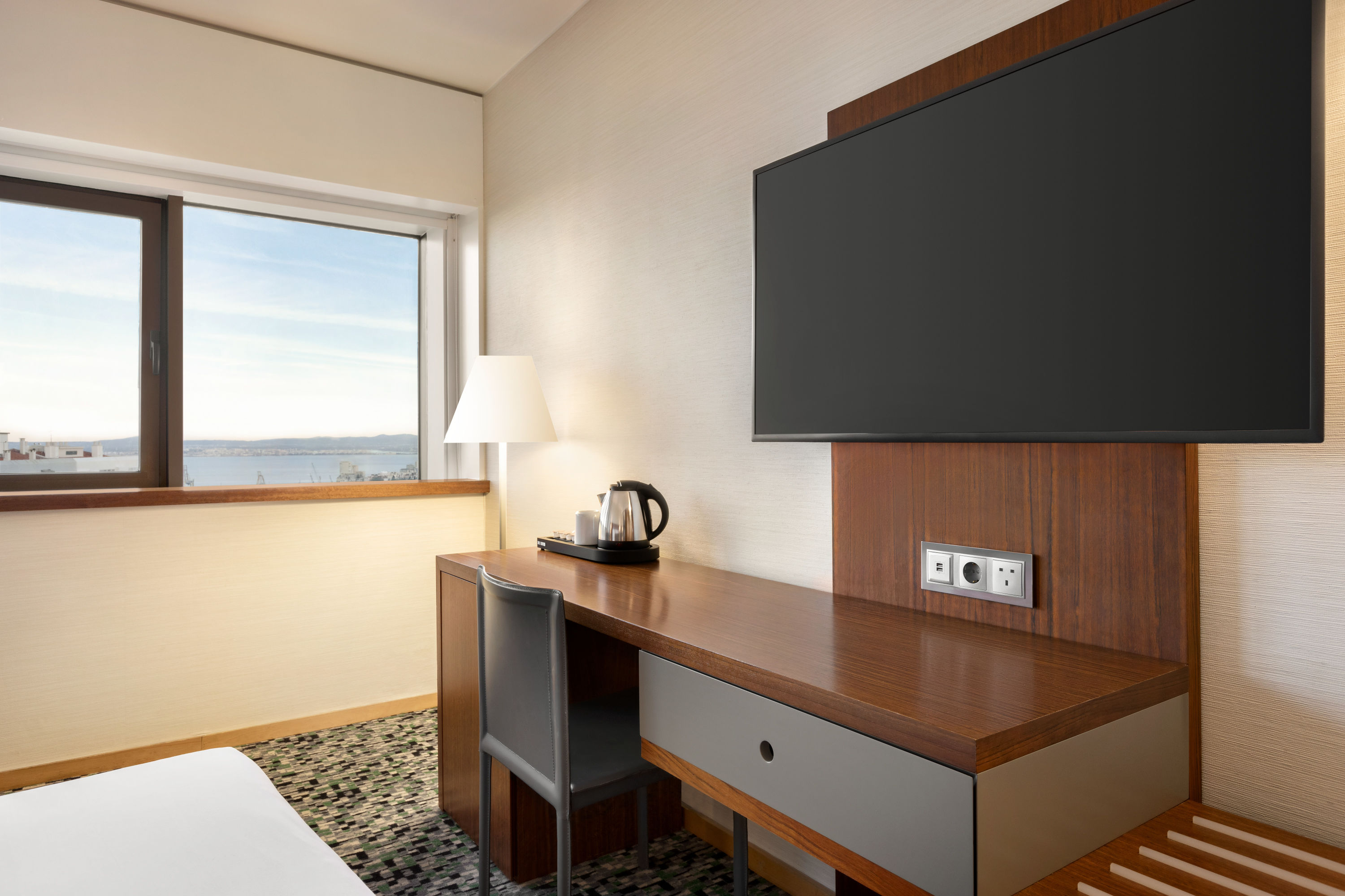 Guest room at the Ramada by Wyndham Lisbon in Lisbon, Other than US/Canada