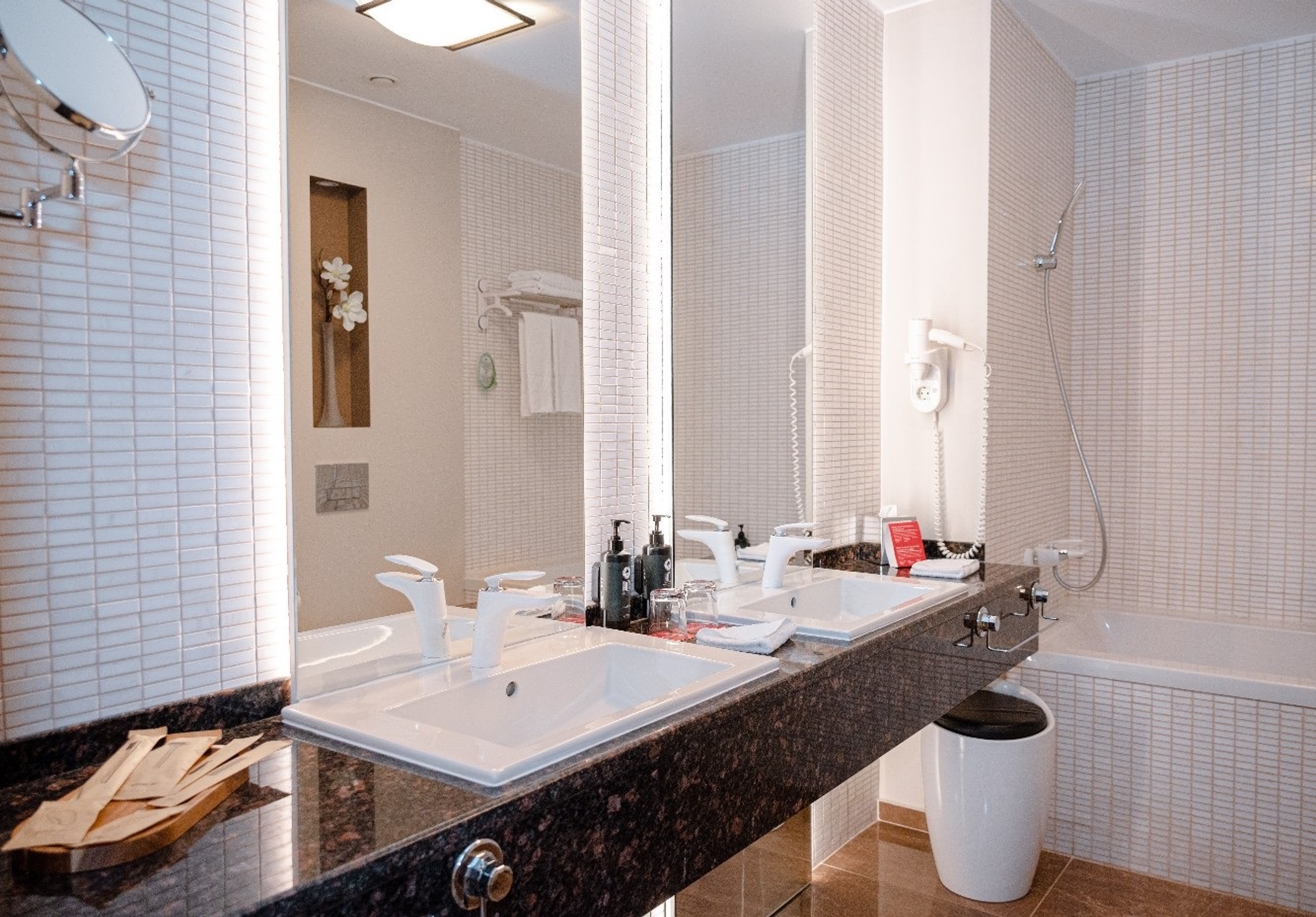 Guest room bath at the Ramada Plaza by Wyndham Craiova in Craiova, Other than US/Canada