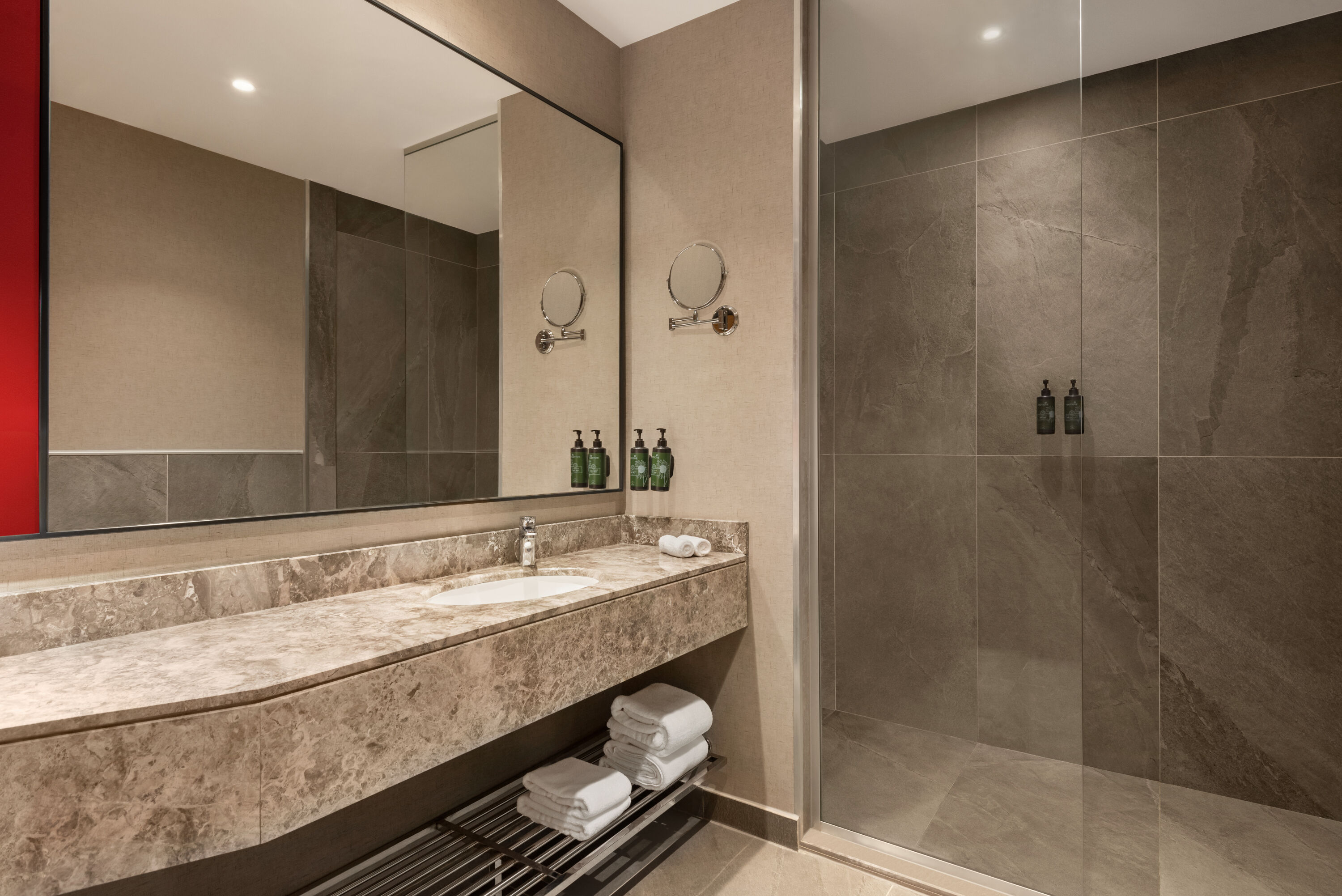 Guest room bath at the Ramada Encore by Wyndham Al Khobar Corniche in Khobar, Other than US/Canada