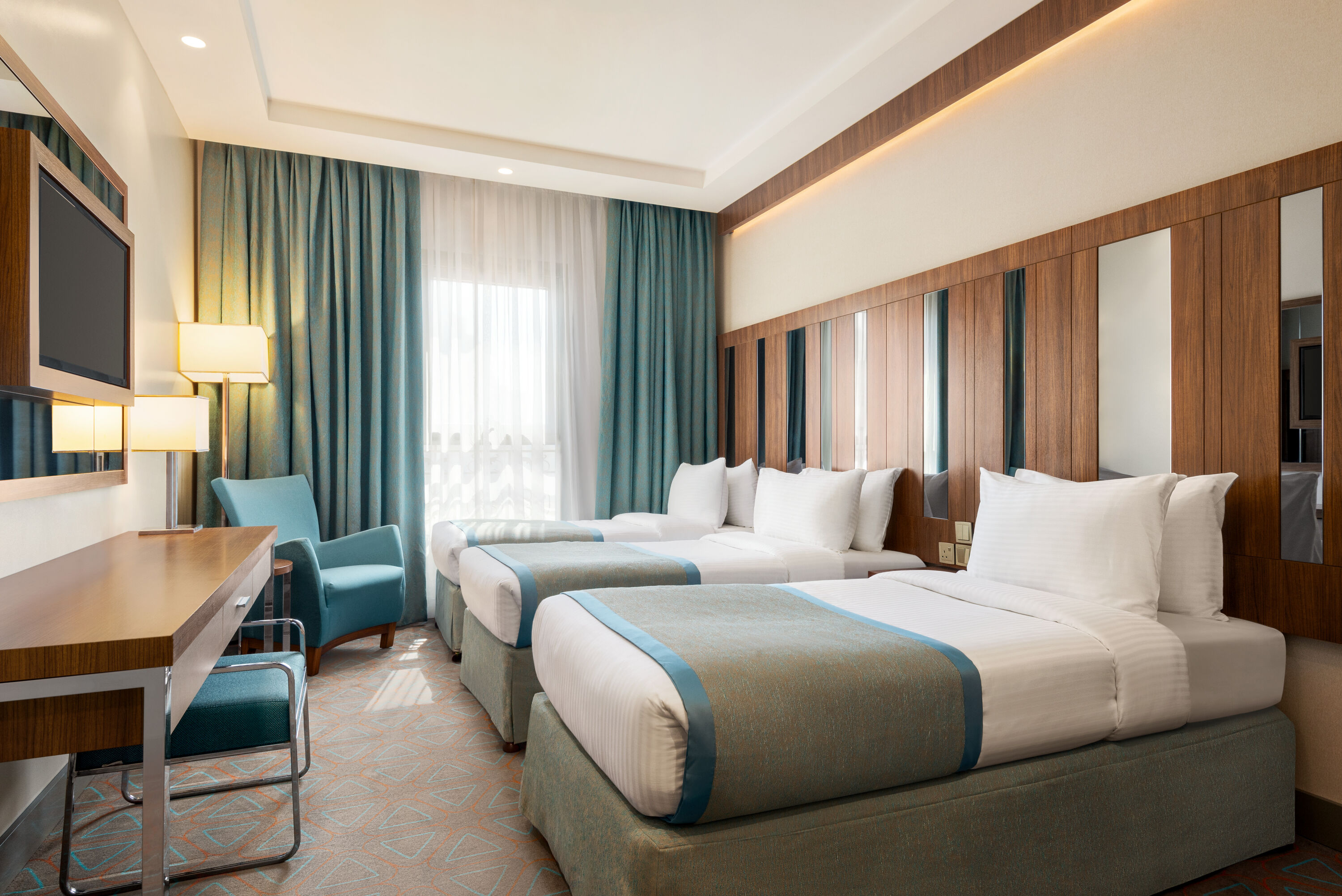 Guest room at the Ramada by Wyndham Makkah Zad Al Tayseer in Makkah, Other than US/Canada