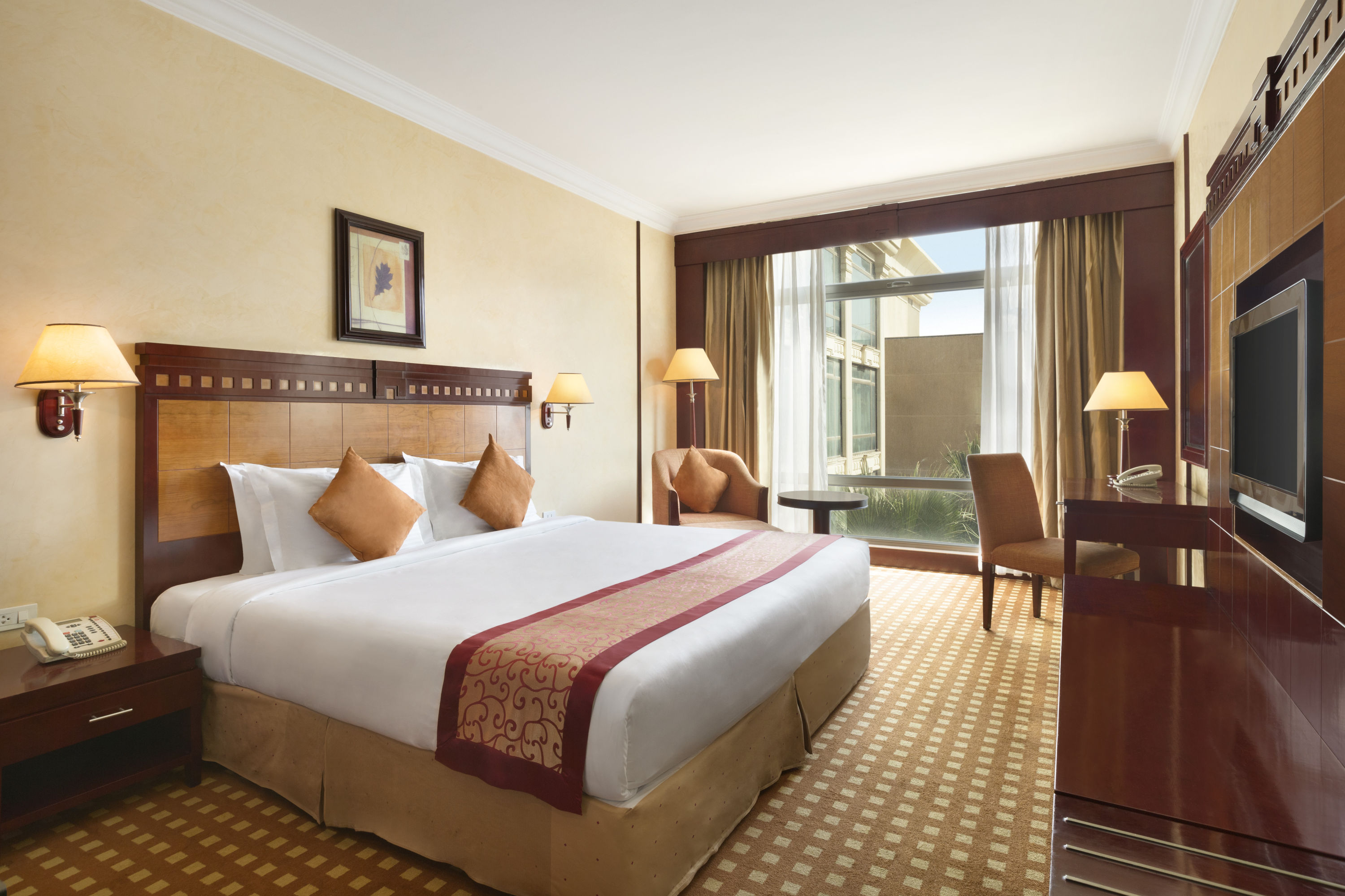Guest room at the Ramada by Wyndham Riyadh in Riyadh, Other than US/Canada
