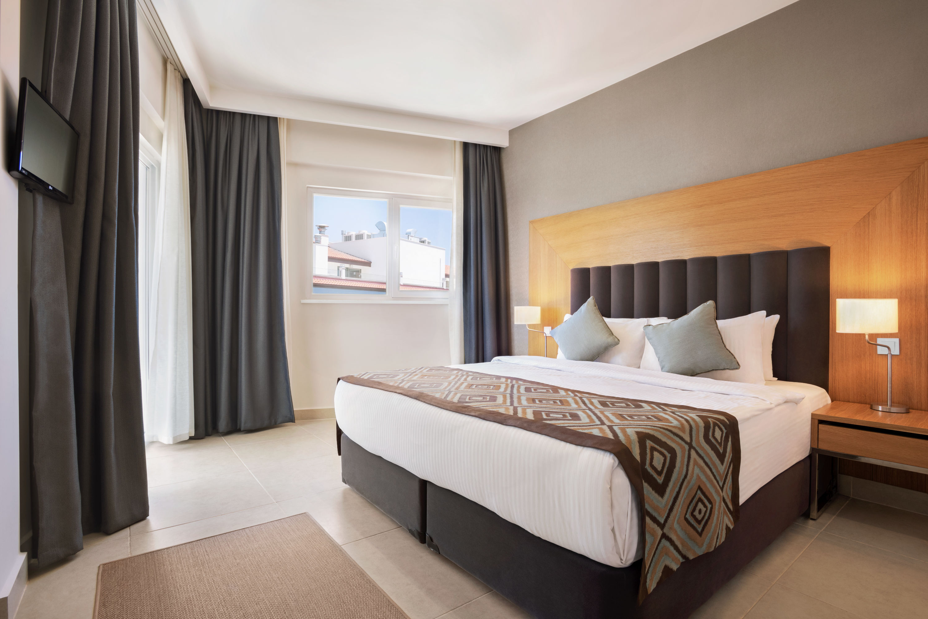 Guest room at the Ramada Hotel & Suites by Wyndham Kusadasi in Kusadasi, Other than US/Canada