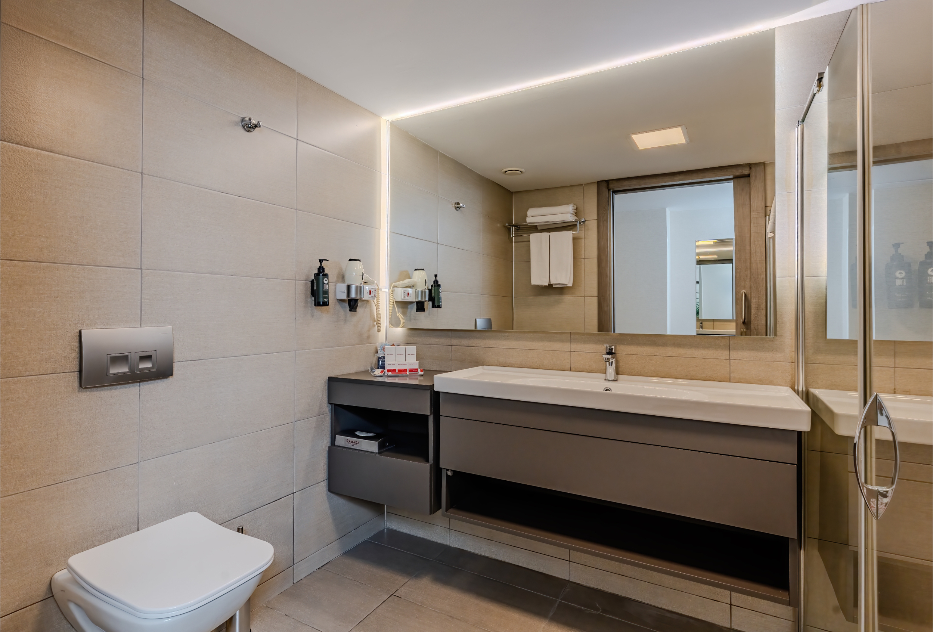 Guest room bath at the Ramada Plaza by Wyndham Izmir in Izmir, Other than US/Canada