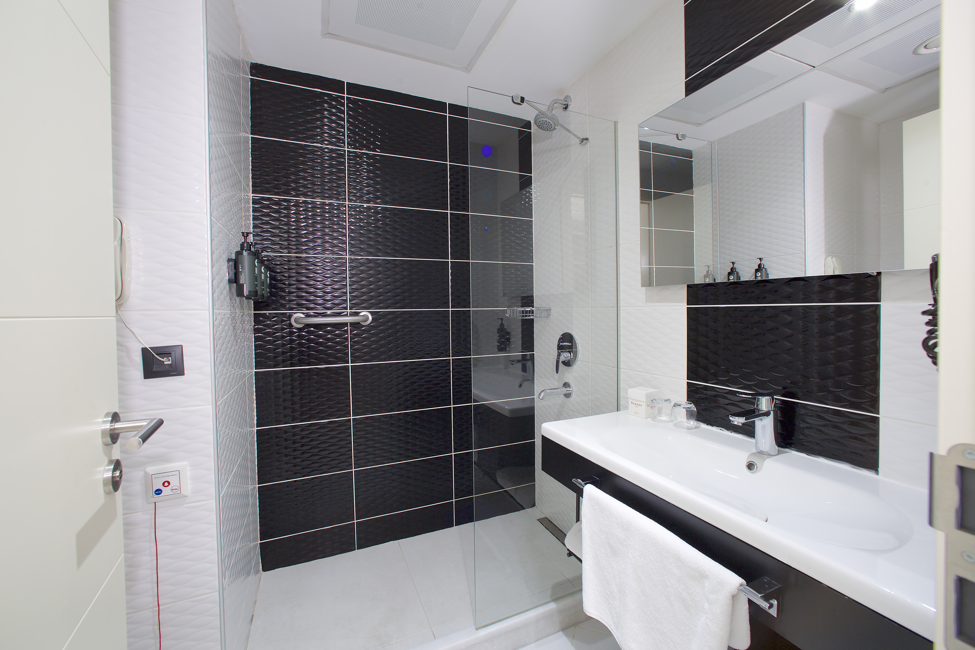 Guest room bath at the Ramada by Wyndham Soma in Soma, Other than US/Canada