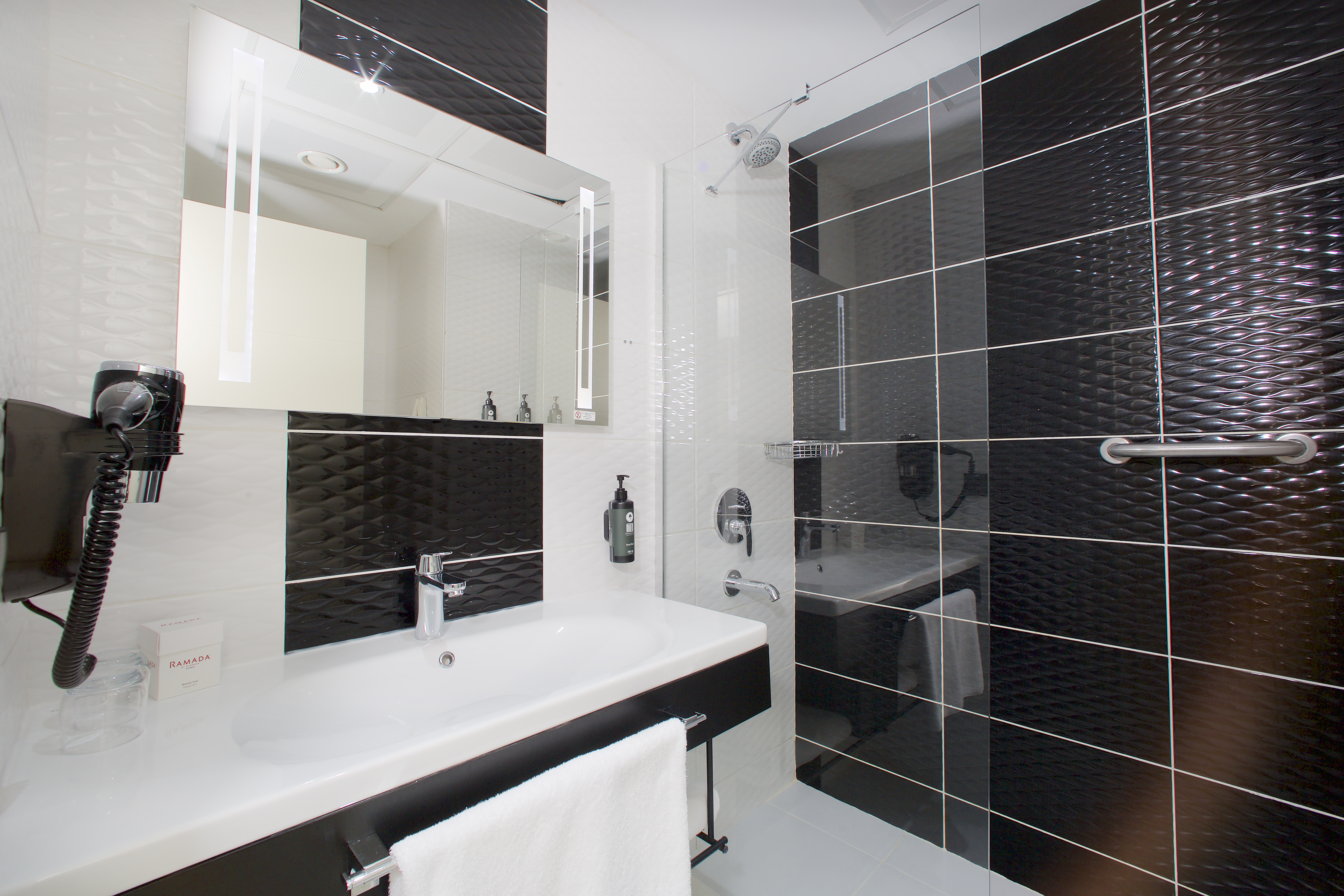 Guest room bath at the Ramada by Wyndham Soma in Soma, Other than US/Canada
