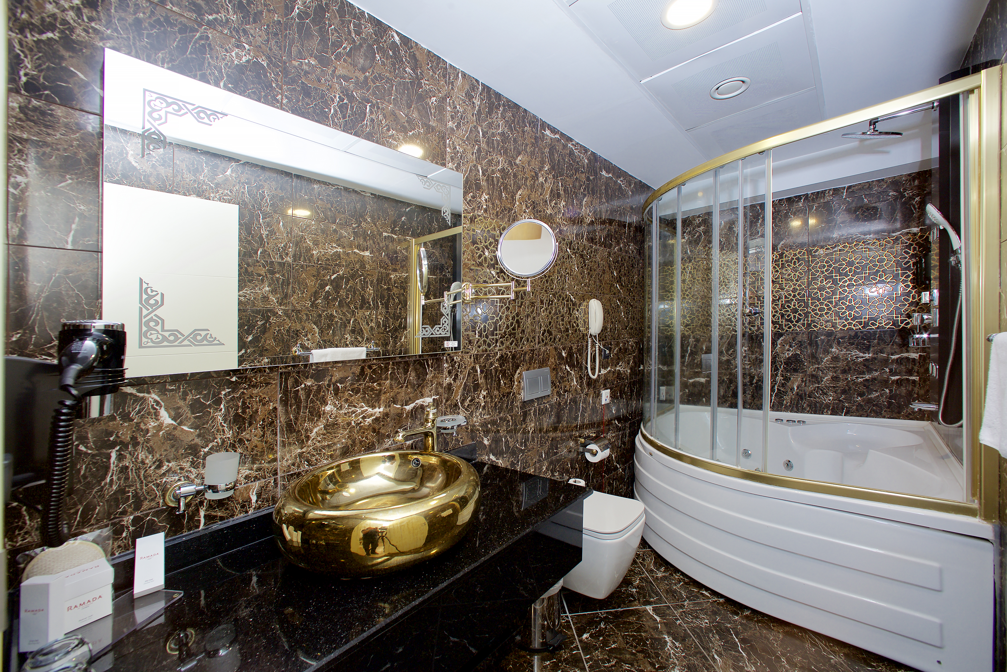 Guest room bath at the Ramada by Wyndham Soma in Soma, Other than US/Canada