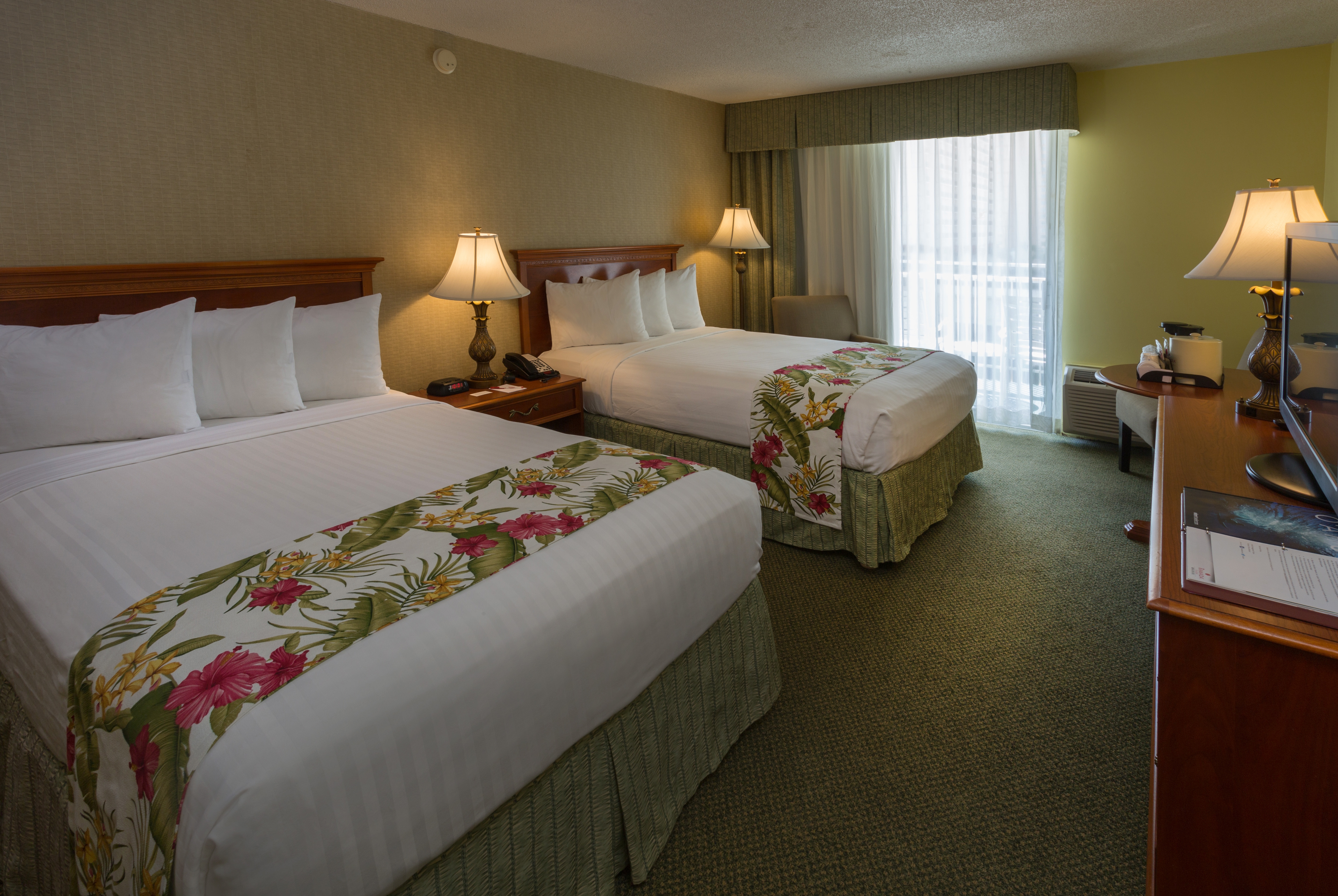 Guest room at the Ramada Plaza by Wyndham Waikiki in Honolulu, Hawaii
