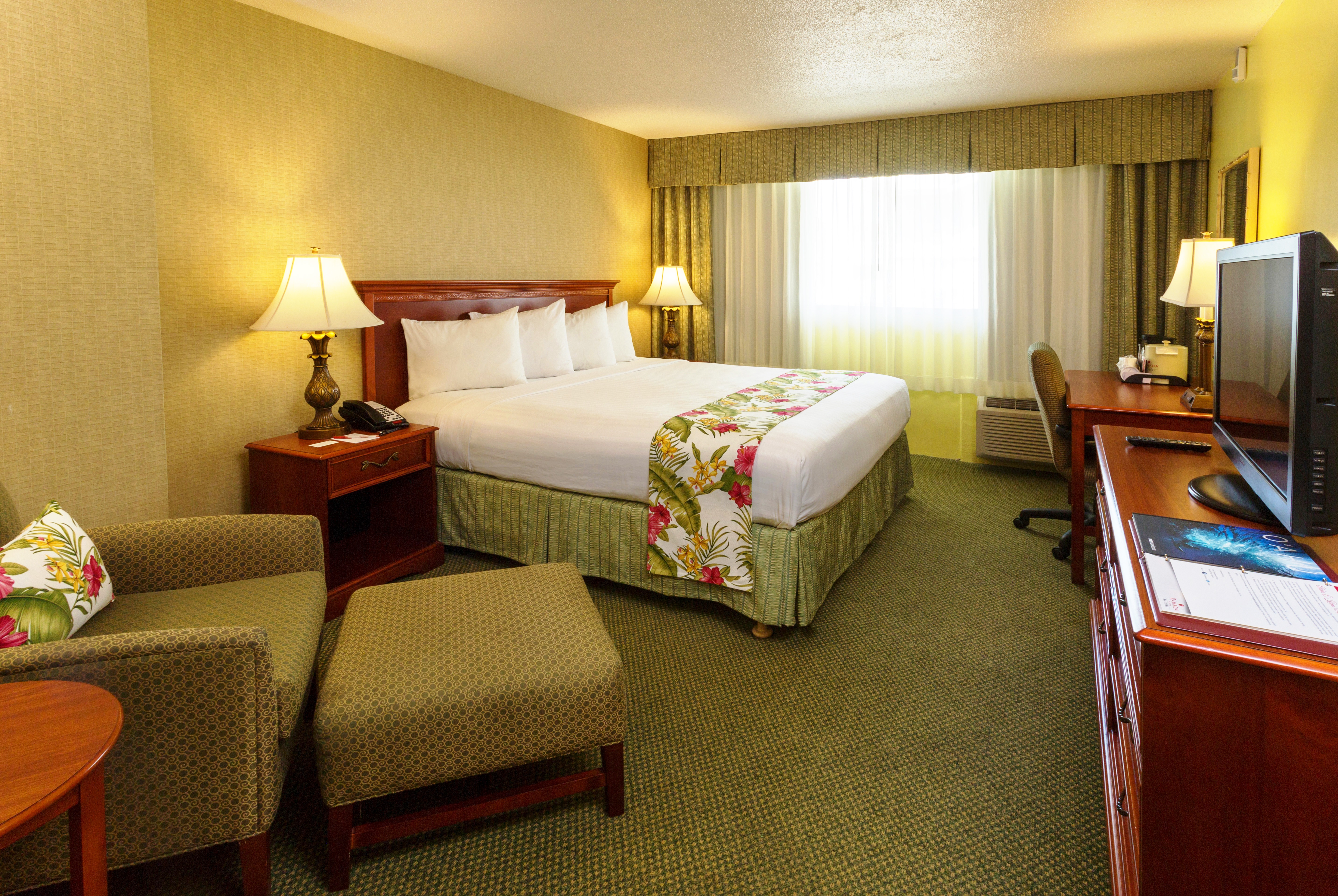 Guest room at the Ramada Plaza by Wyndham Waikiki in Honolulu, Hawaii
