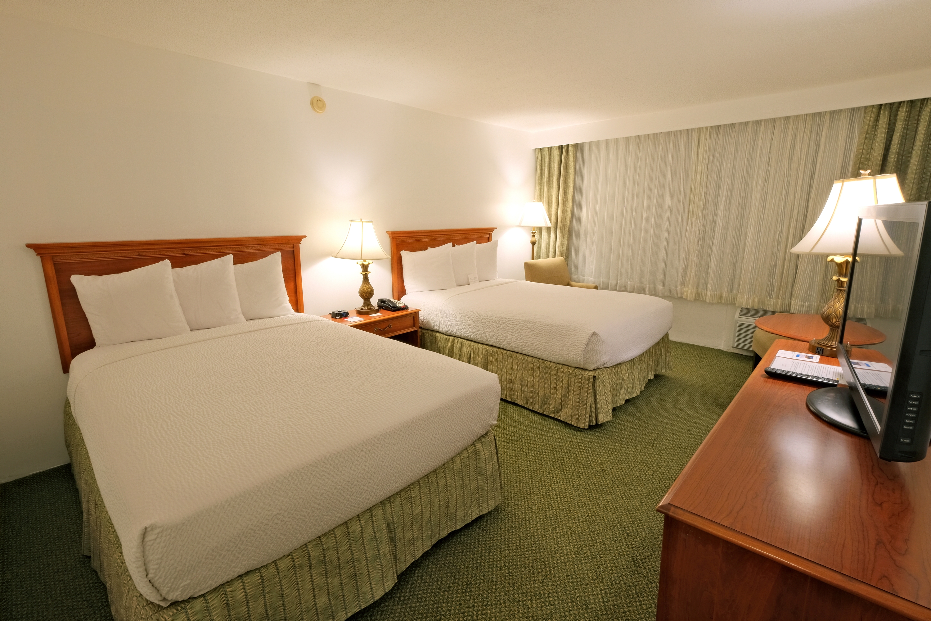 Guest room at the Ramada Plaza by Wyndham Waikiki in Honolulu, Hawaii