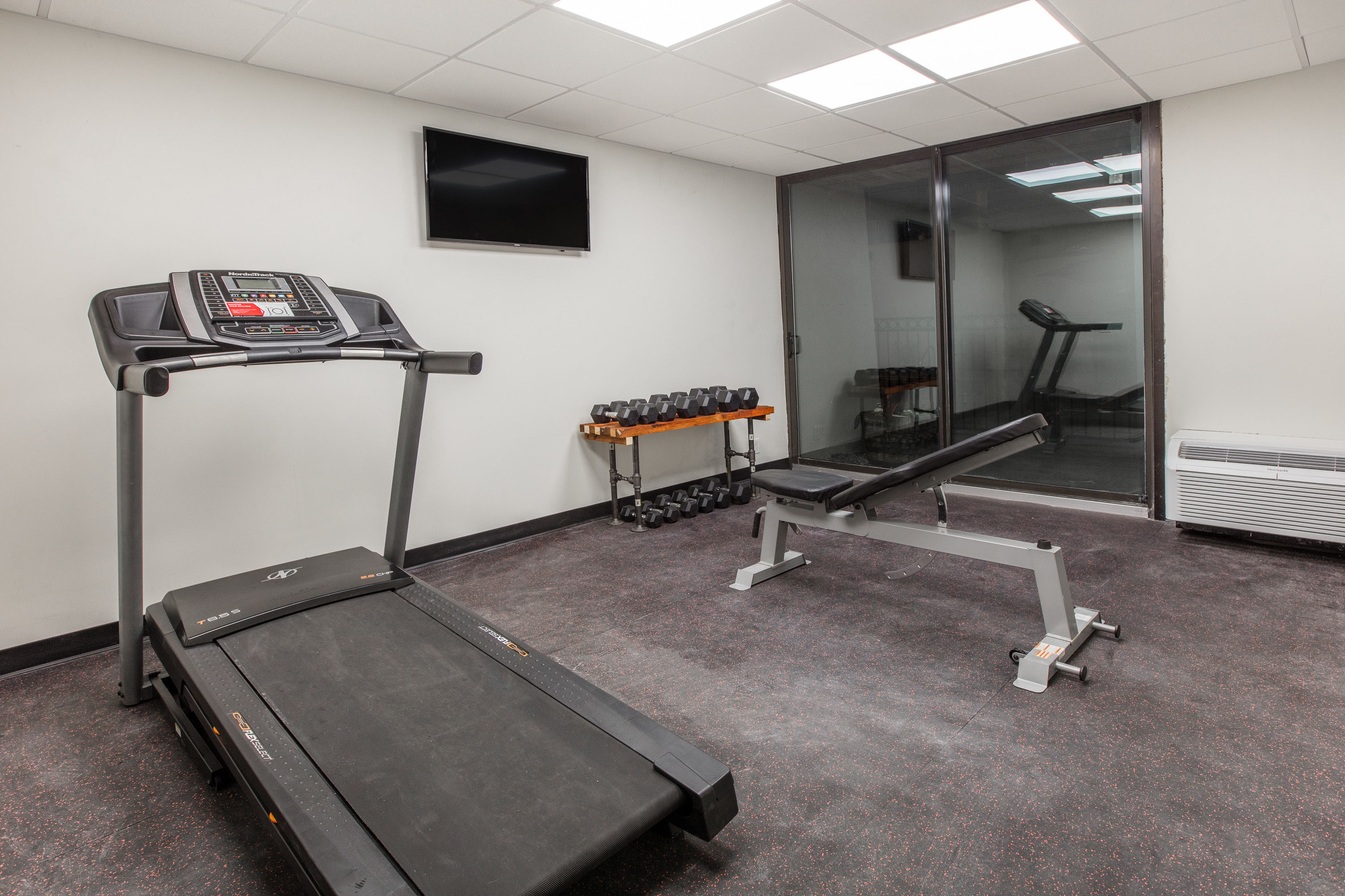 Fitness room at Ramada by Wyndham Austin South in Austin, Texas