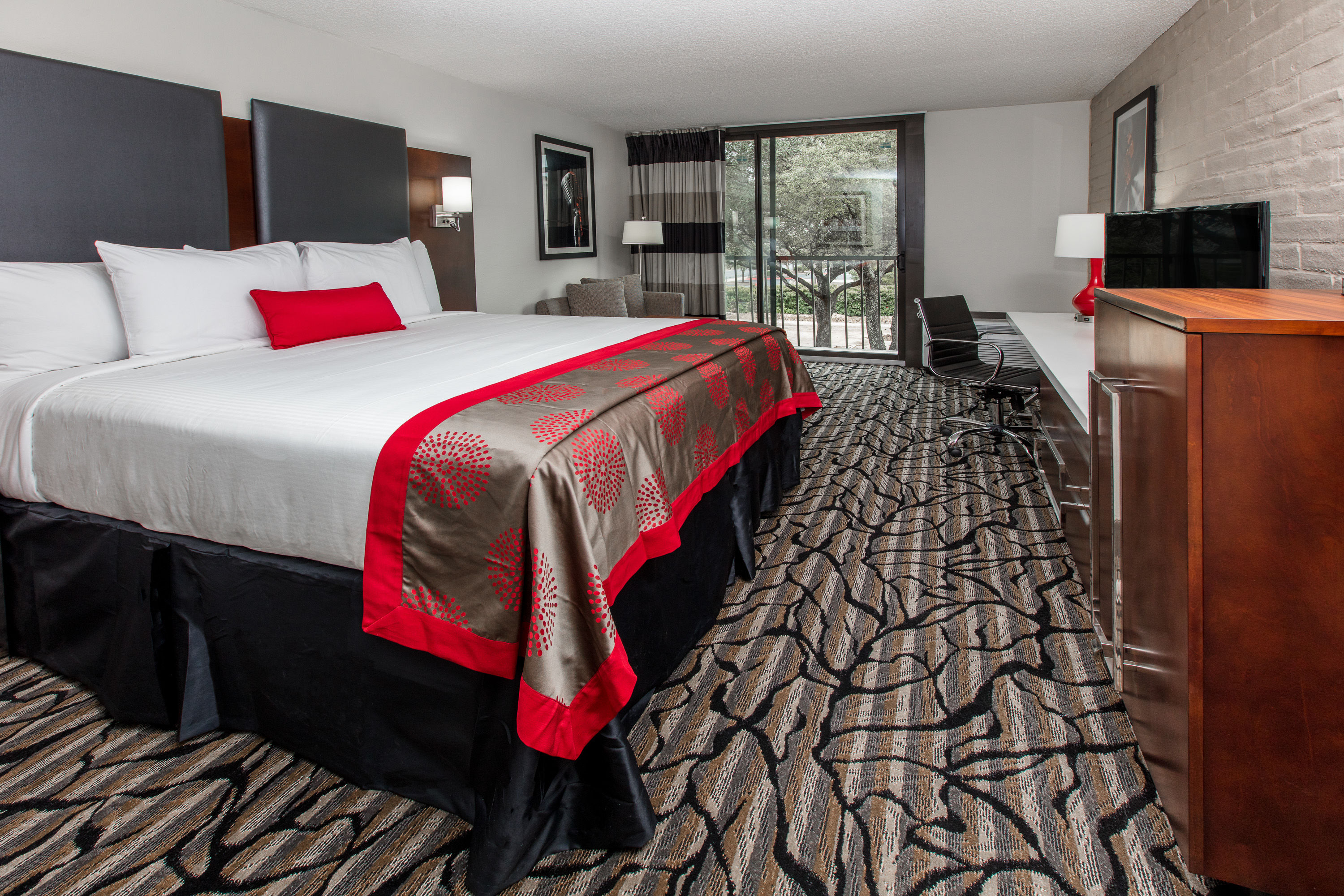 Guest room at the Ramada by Wyndham Austin South in Austin, Texas