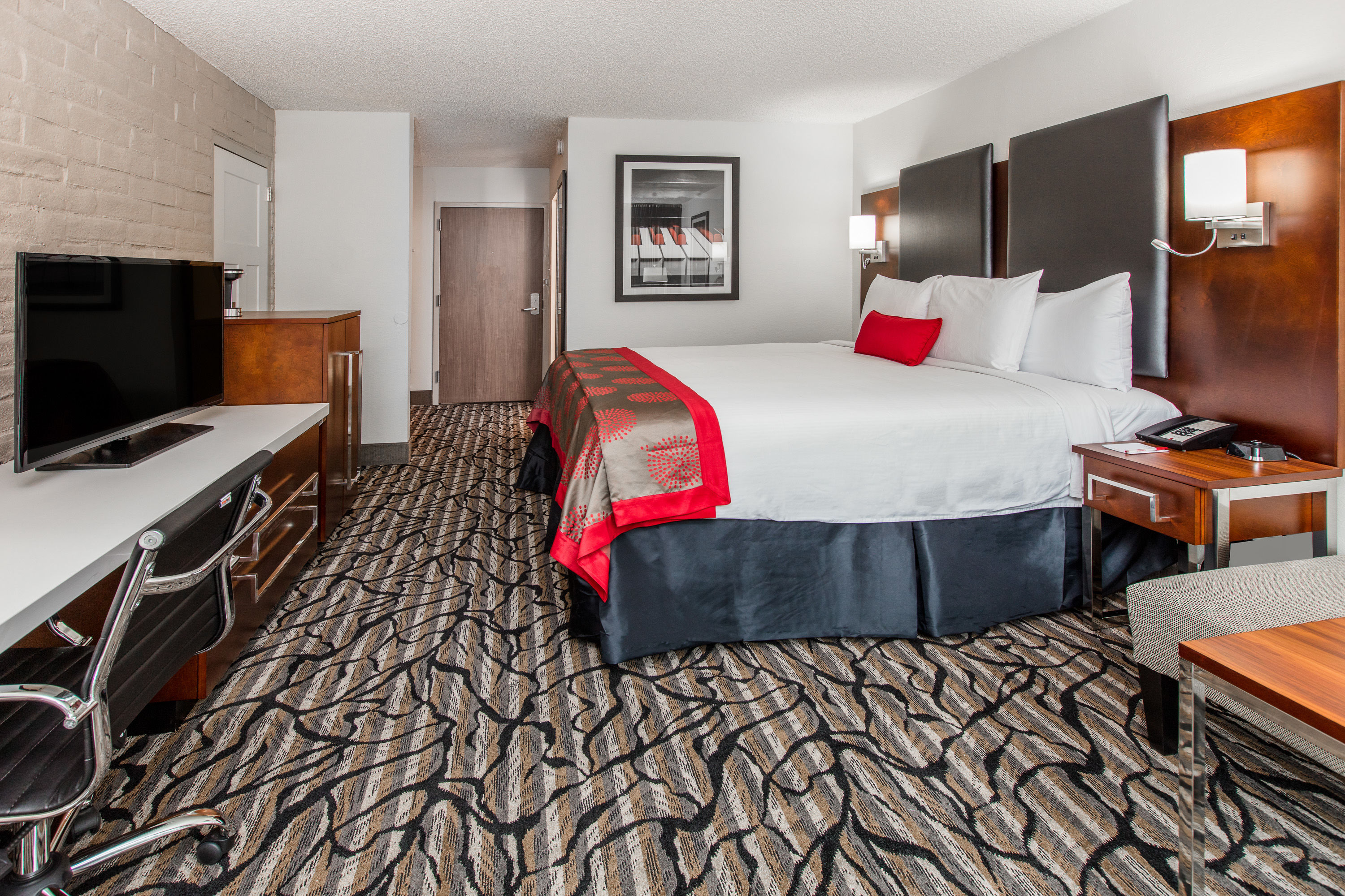 Guest room at the Ramada by Wyndham Austin South in Austin, Texas