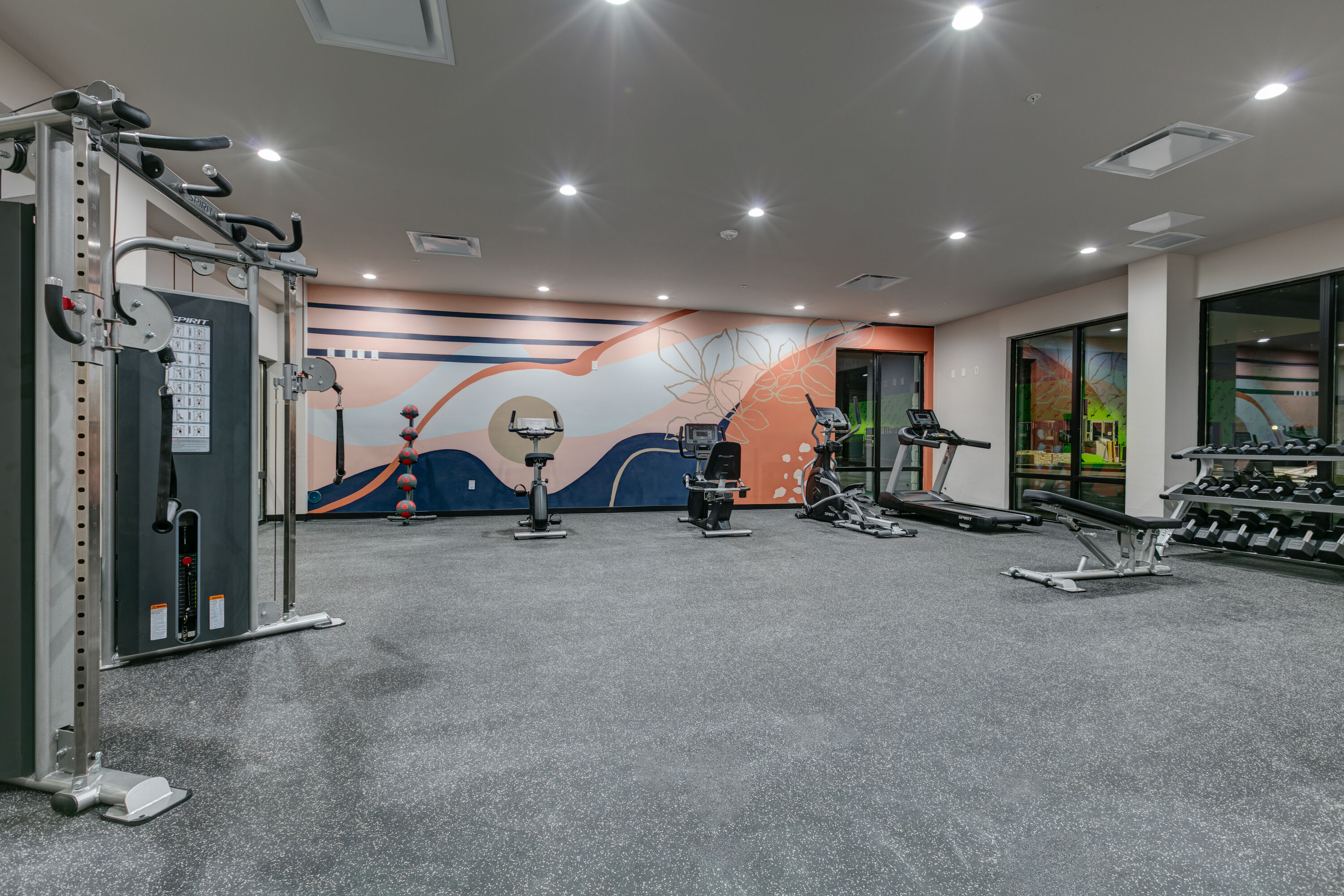 Fitness room at The Elm, a Ramada by Wyndham in Little Elm, Texas