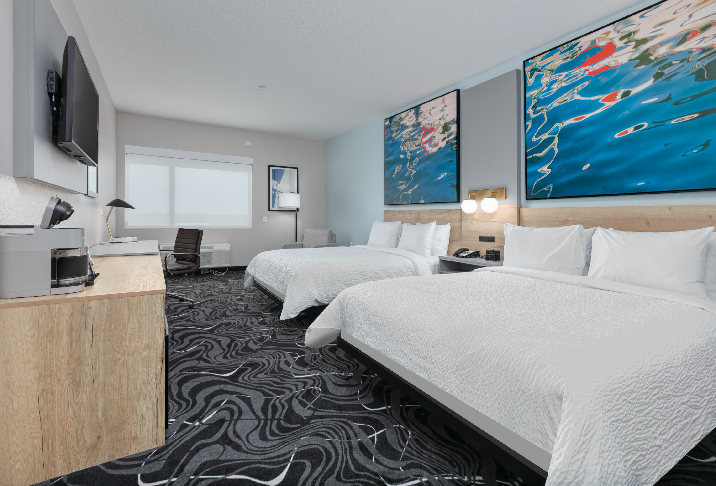 Guest room at the The Elm, a Ramada by Wyndham in Little Elm, Texas