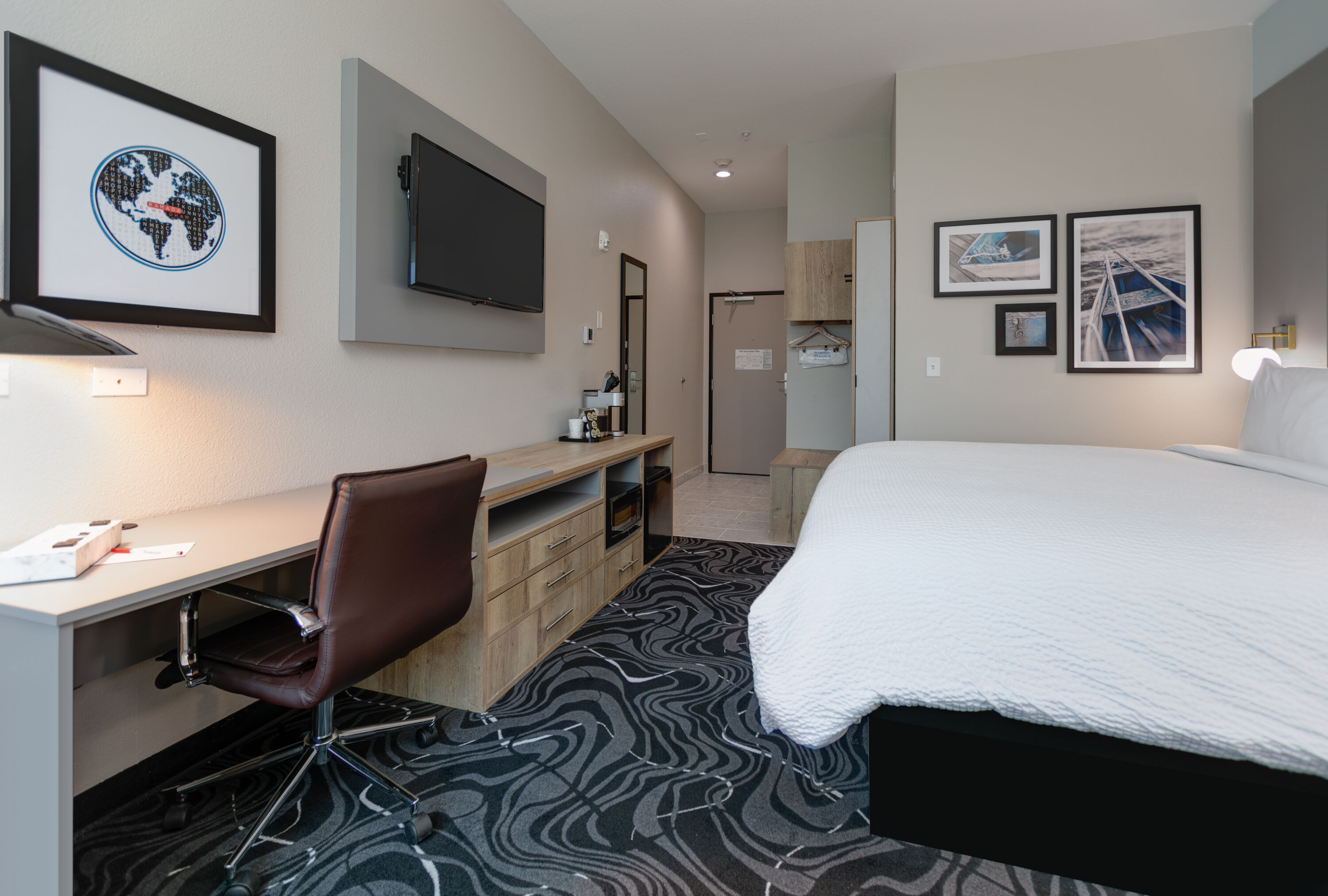 Guest room at the The Elm, a Ramada by Wyndham in Little Elm, Texas