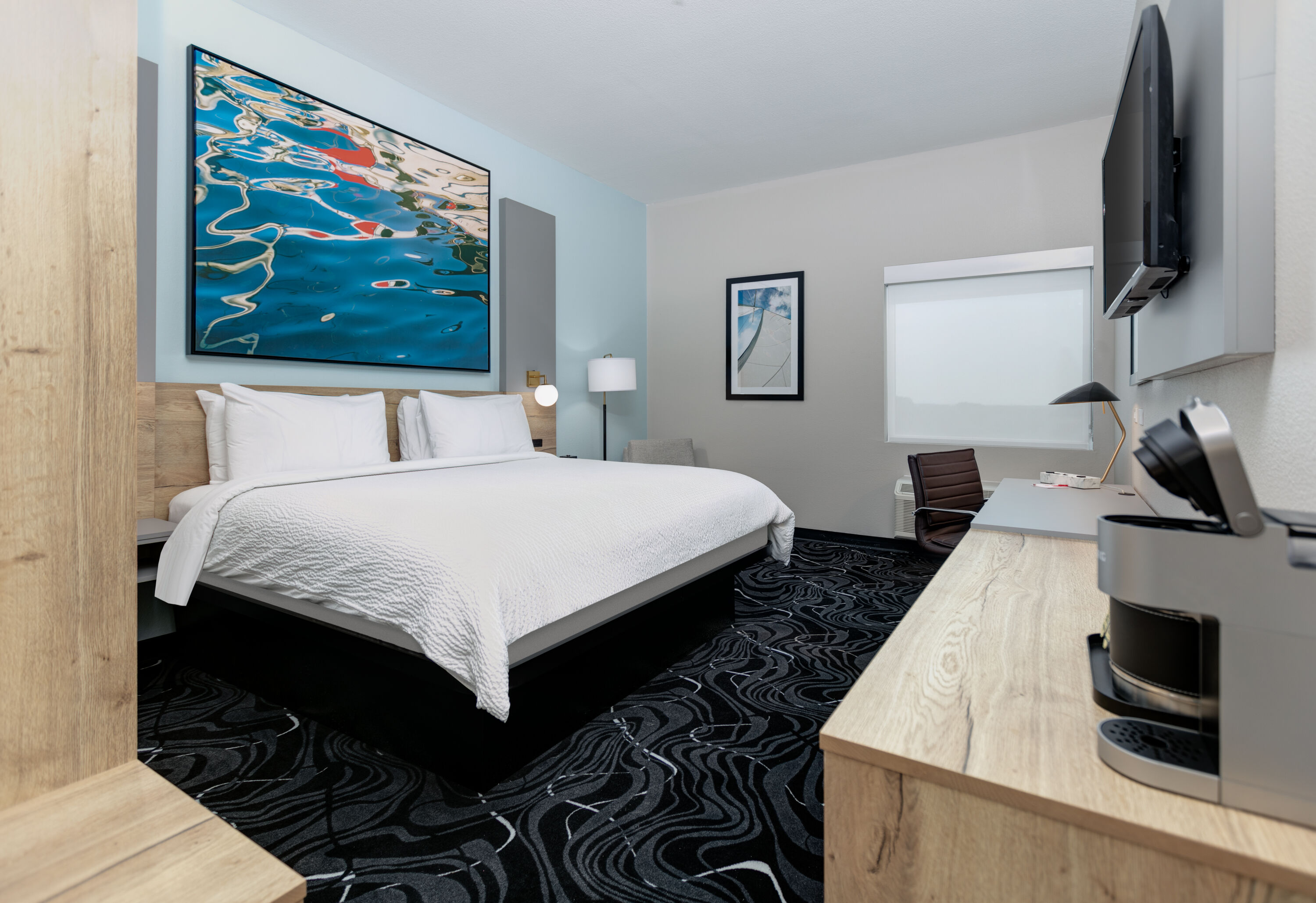 Guest room at the The Elm, a Ramada by Wyndham in Little Elm, Texas