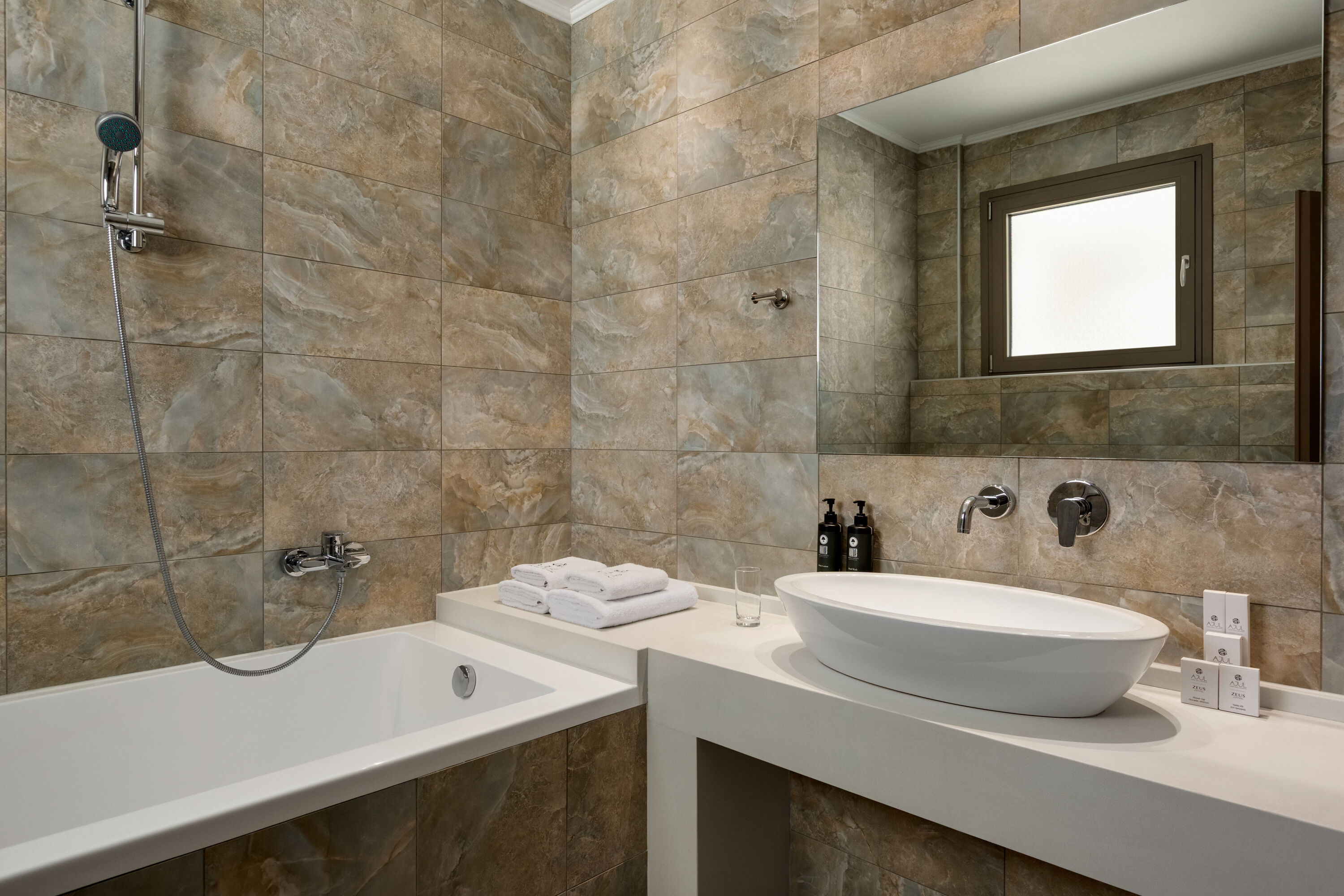 Guest room bath at the Zeus Eleva Ajul, a Registry Collection Hotel in Agia Paraskevi Chalikidi, Other than US/Canada