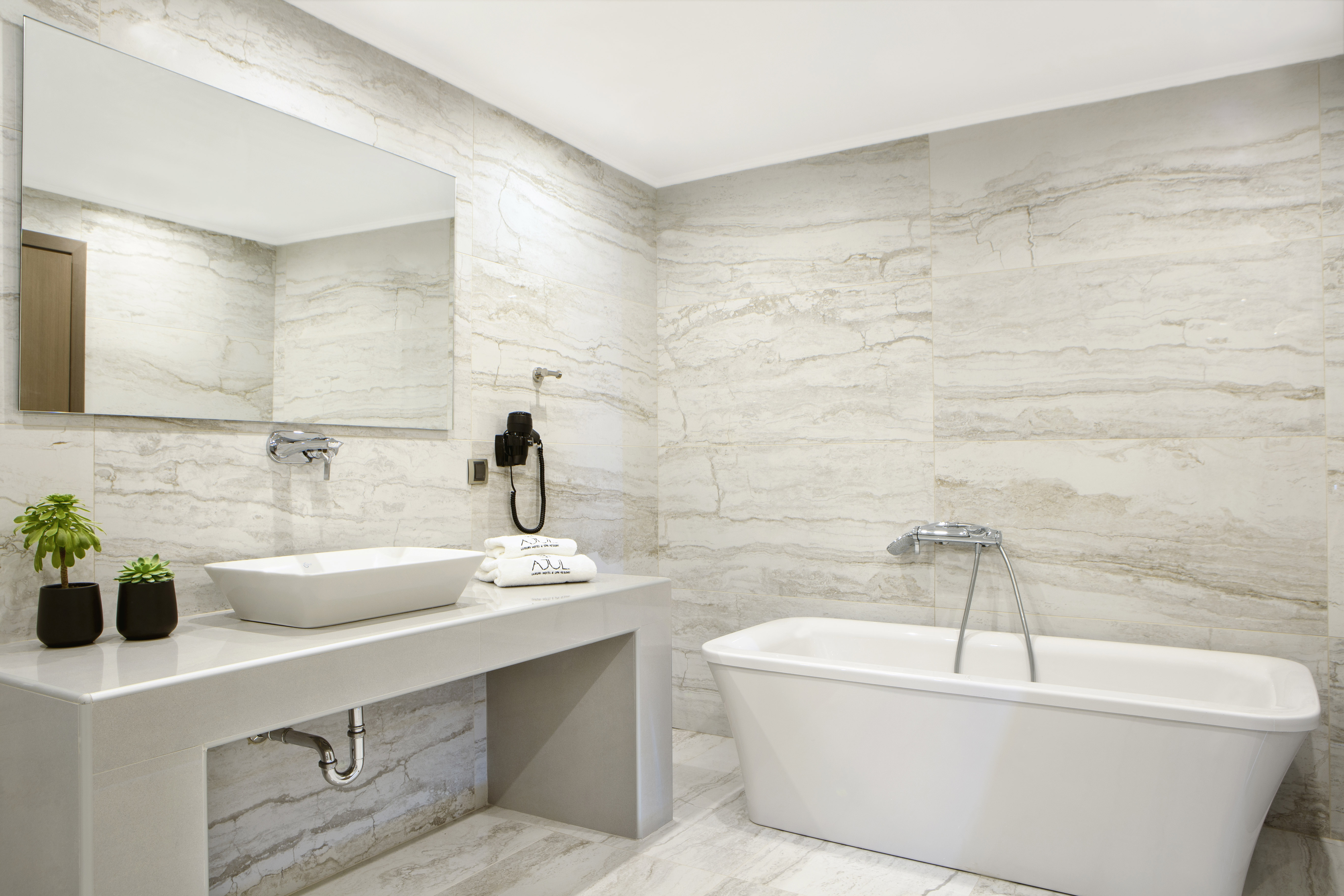 Guest room bath at the Zeus Eleva Ajul, a Registry Collection Hotel in Agia Paraskevi Chalikidi, Other than US/Canada