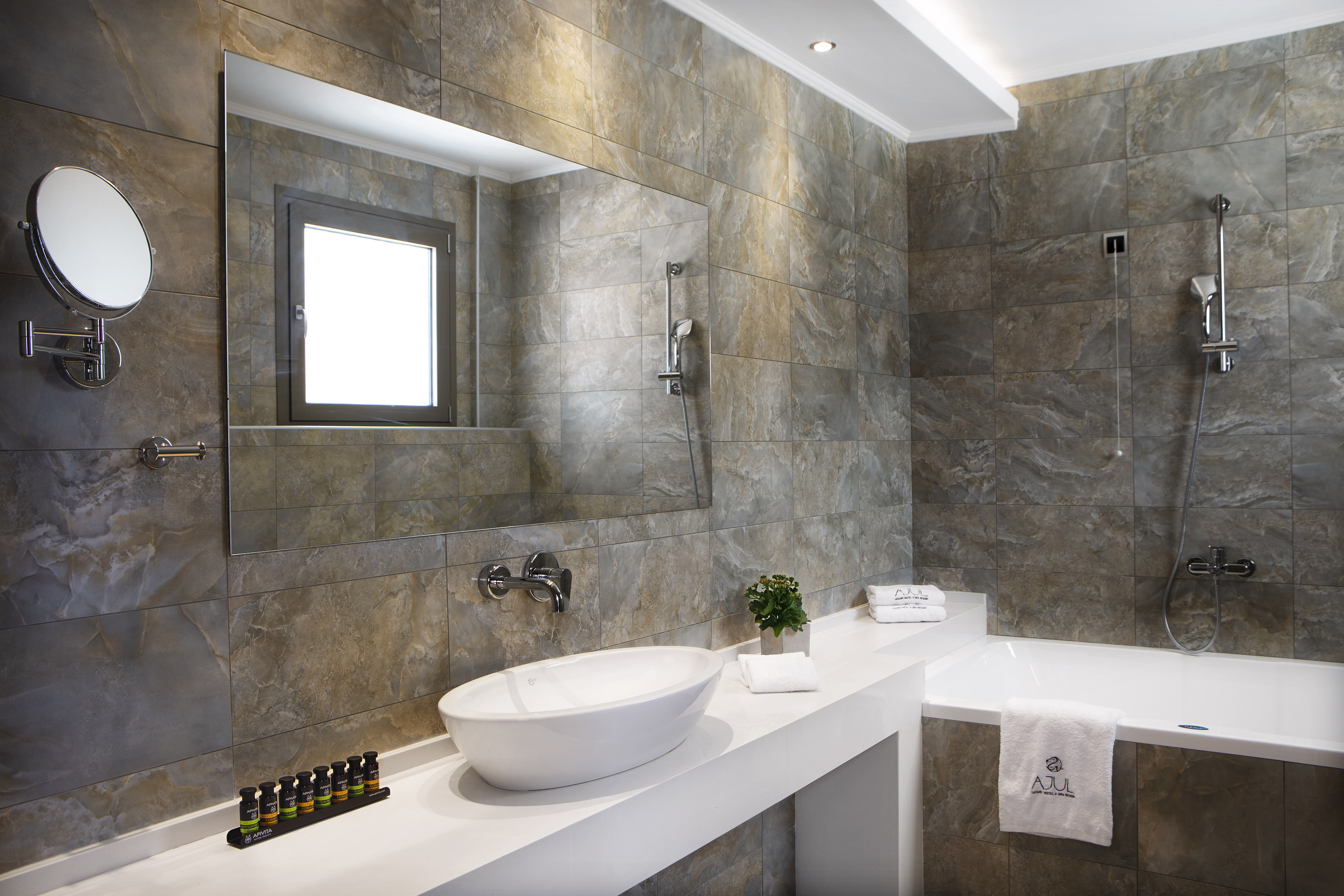 Guest room bath at the Zeus Eleva Ajul, a Registry Collection Hotel in Agia Paraskevi Chalikidi, Other than US/Canada