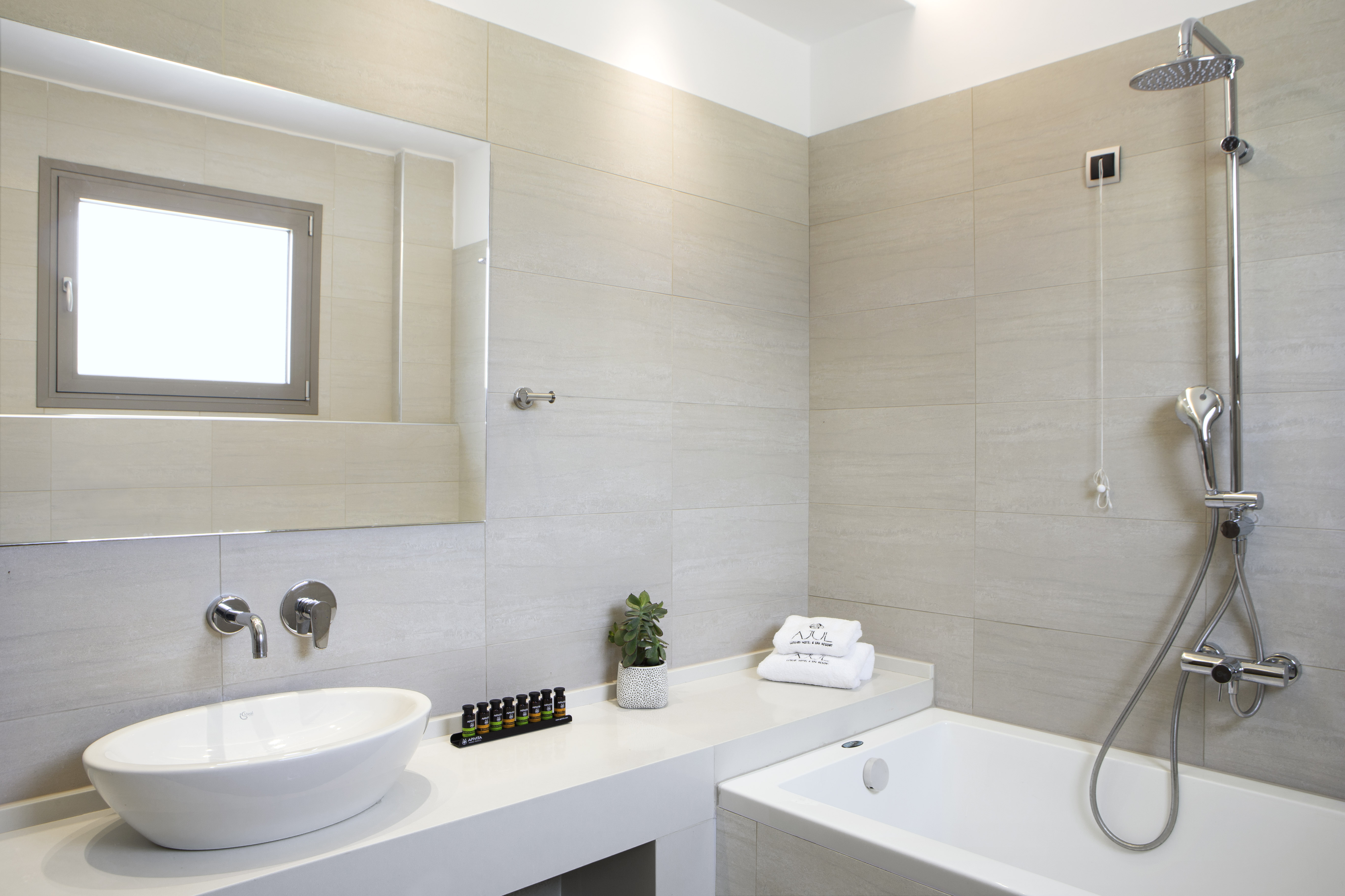 Guest room bath at the Zeus Eleva Ajul, a Registry Collection Hotel in Agia Paraskevi Chalikidi, Other than US/Canada