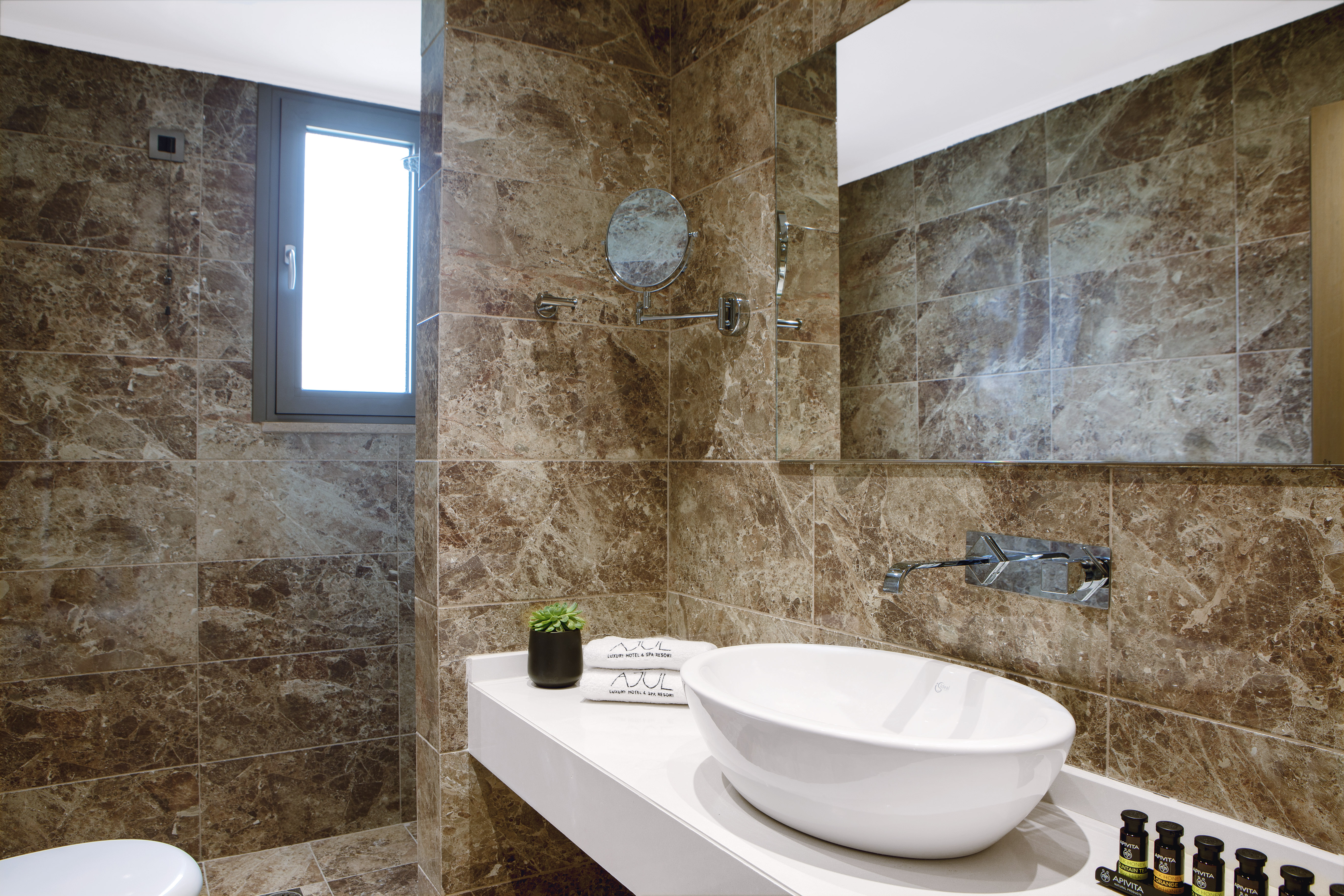 Guest room bath at the Zeus Eleva Ajul, a Registry Collection Hotel in Agia Paraskevi Chalikidi, Other than US/Canada
