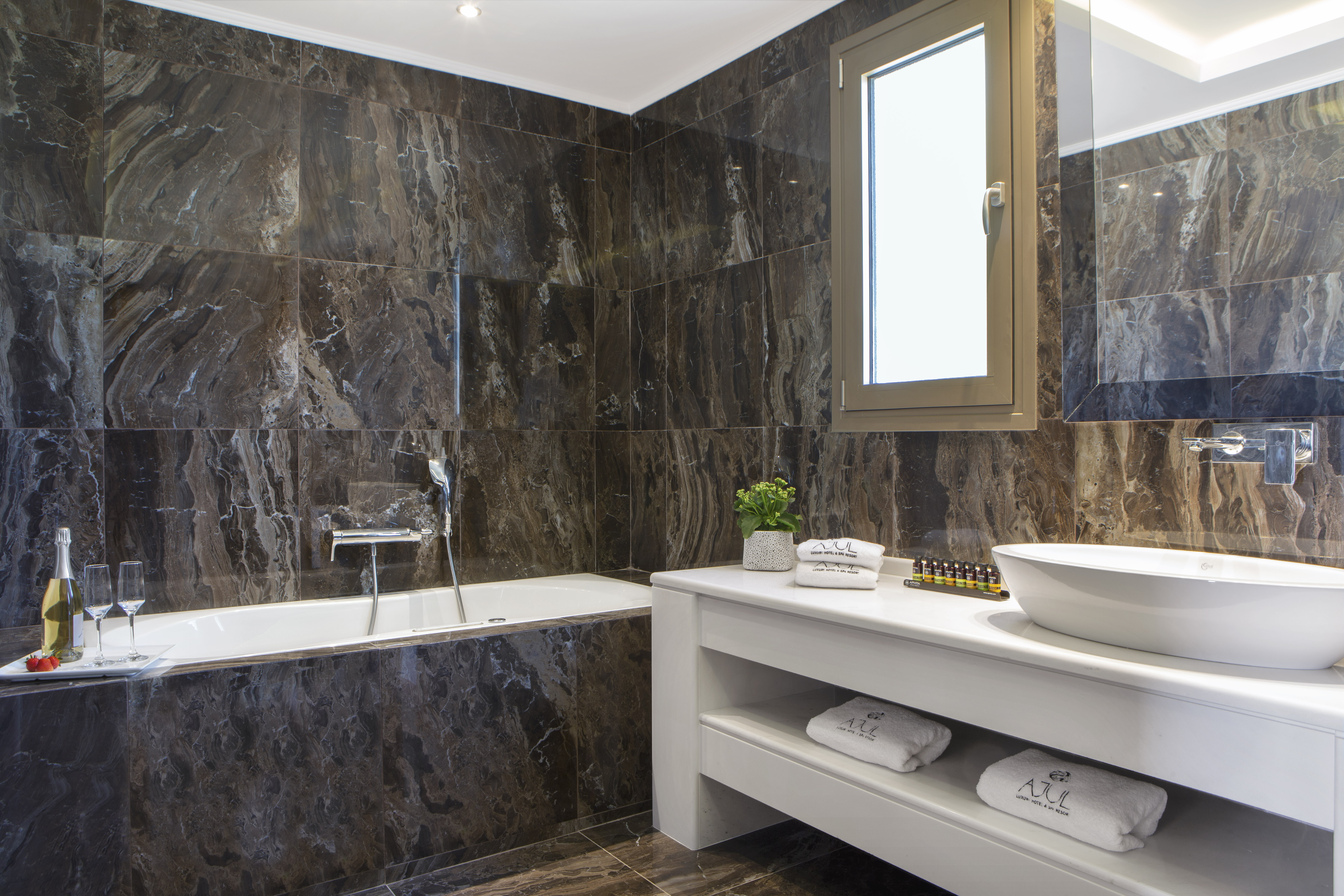 Guest room bath at the Zeus Eleva Ajul, a Registry Collection Hotel in Agia Paraskevi Chalikidi, Other than US/Canada