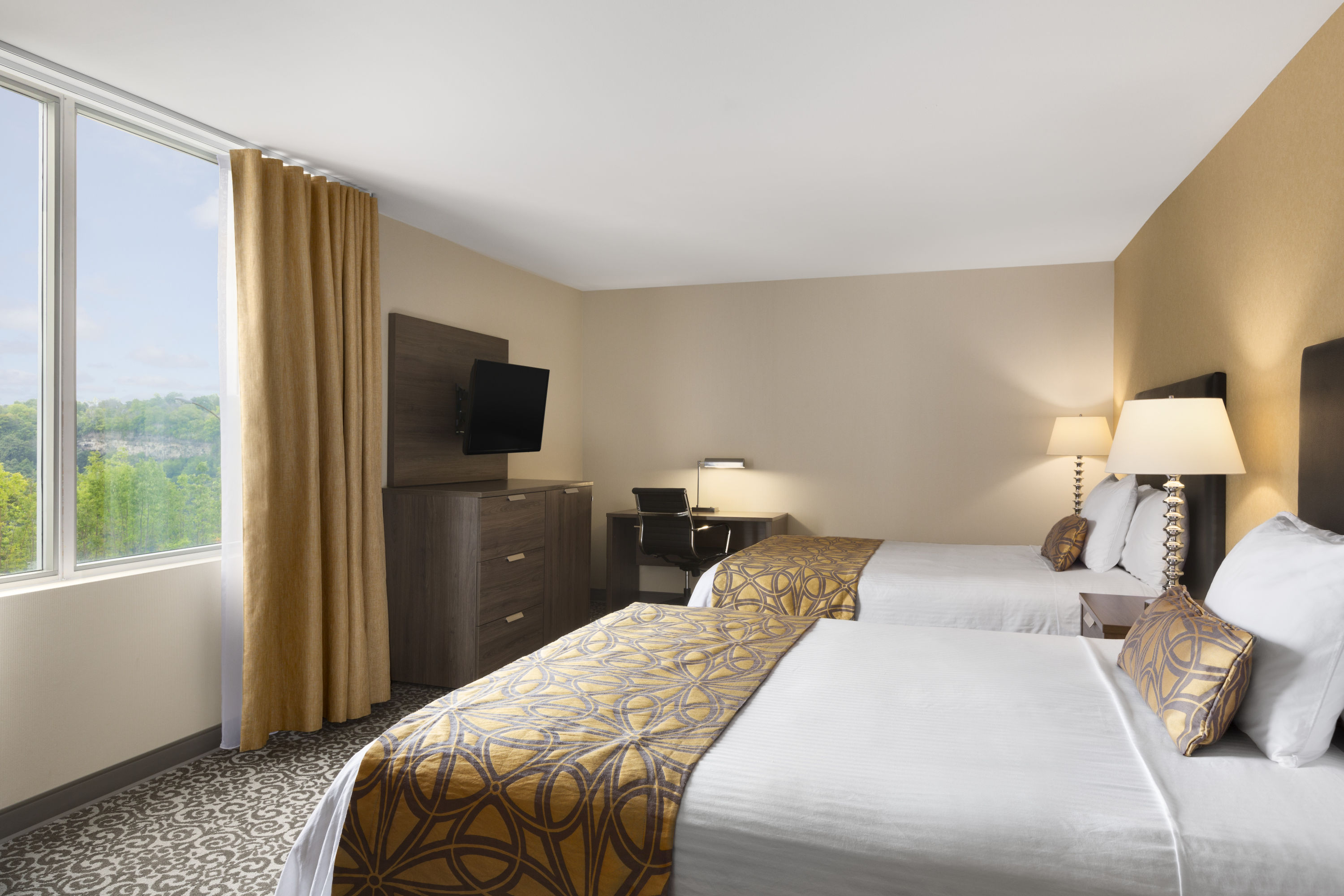 Guest room at the Travelodge by Wyndham Niagara Falls Fallsview in Niagara Falls, Ontario