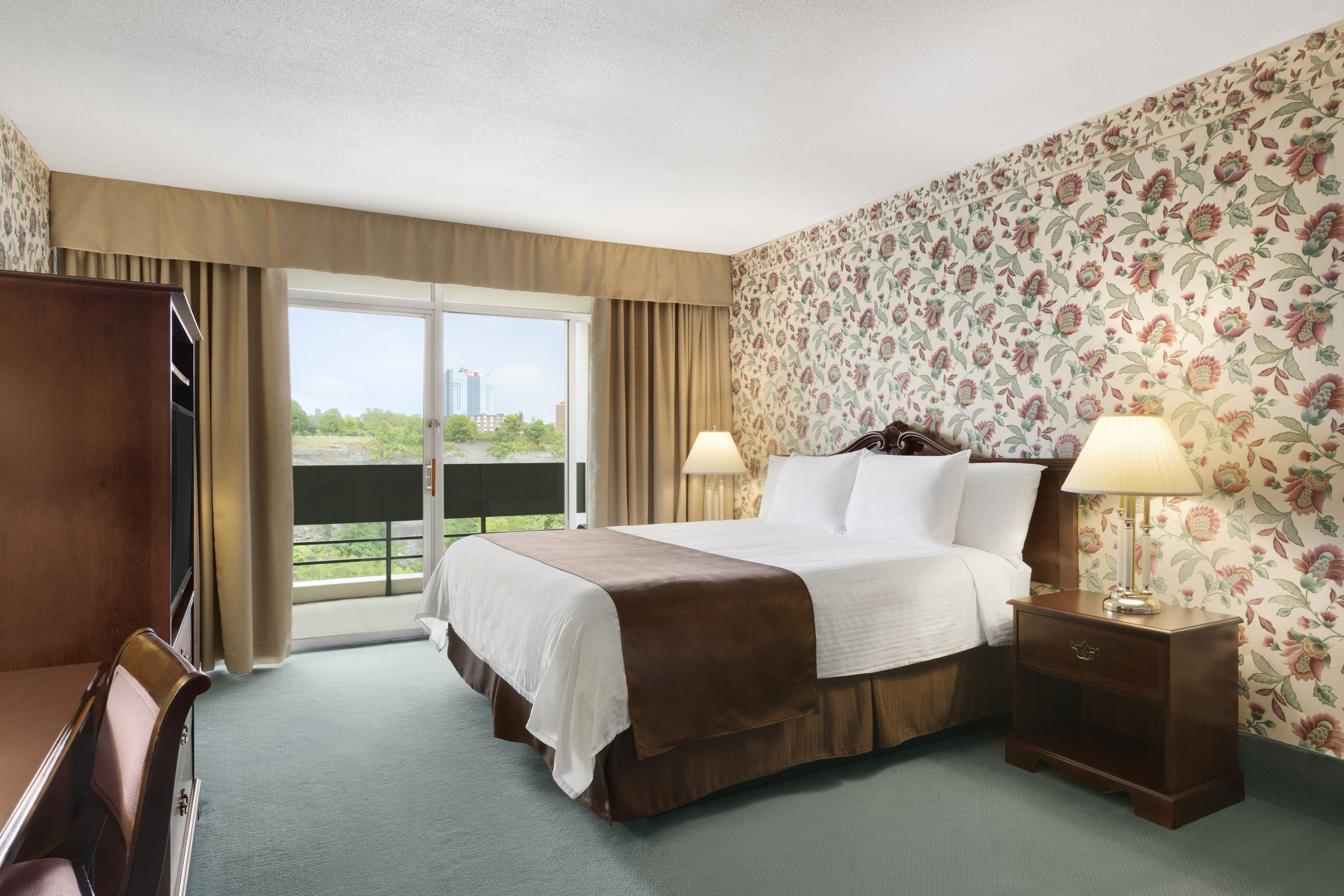 Guest room at the Travelodge by Wyndham Niagara Falls Fallsview in Niagara Falls, Ontario