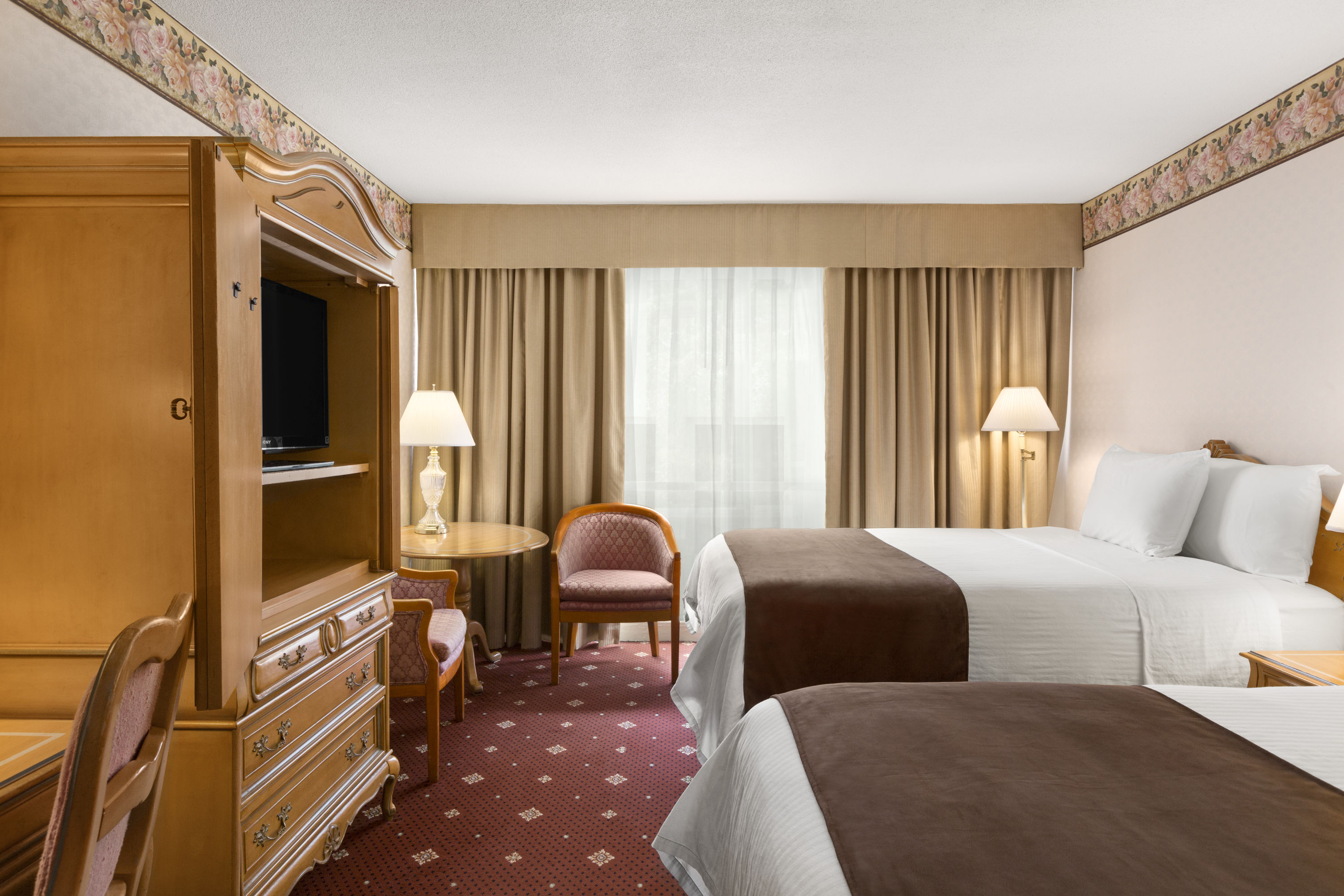 Guest room at the Travelodge by Wyndham Niagara Falls Fallsview in Niagara Falls, Ontario