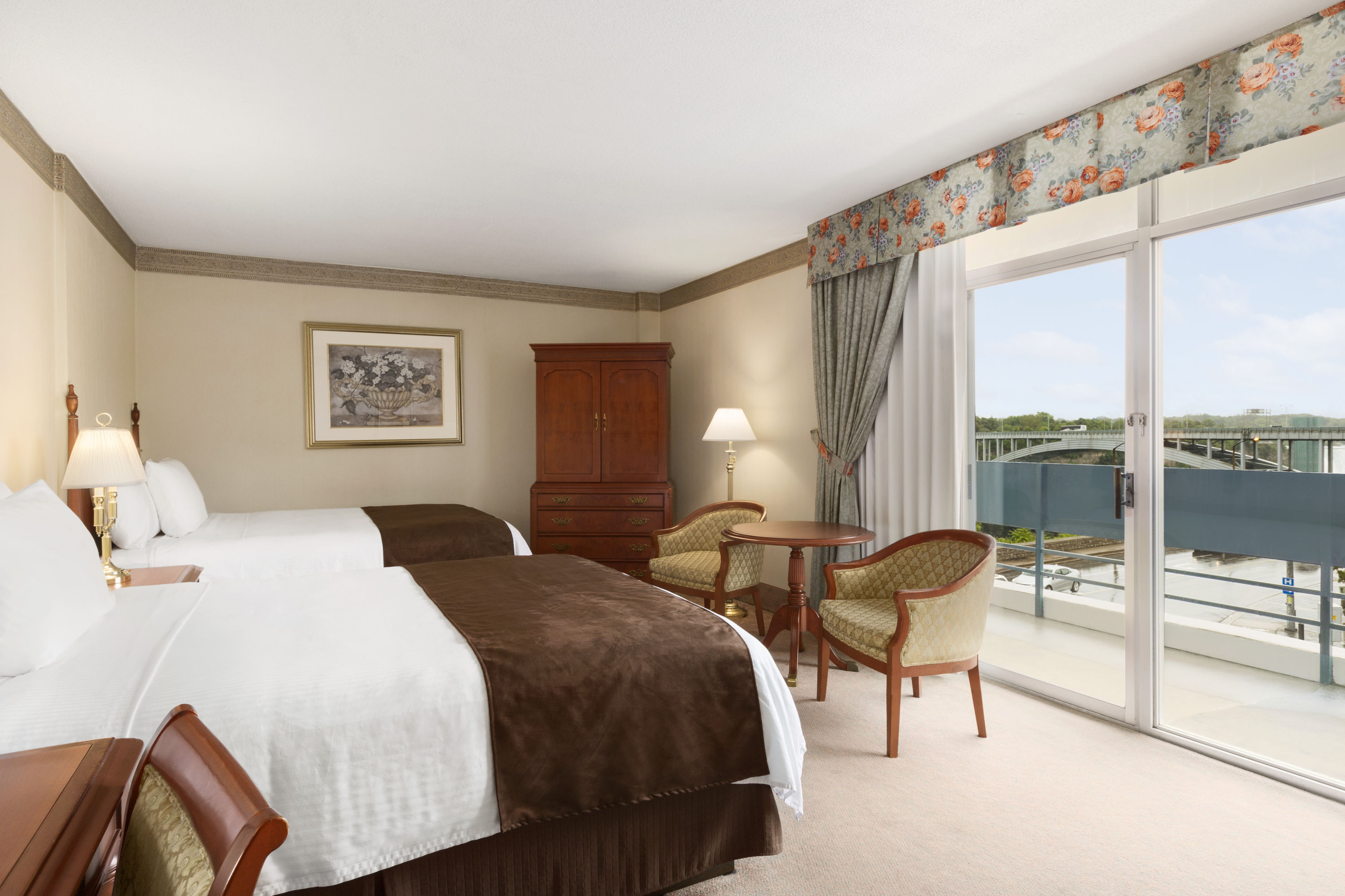 Guest room at the Travelodge by Wyndham Niagara Falls Fallsview in Niagara Falls, Ontario