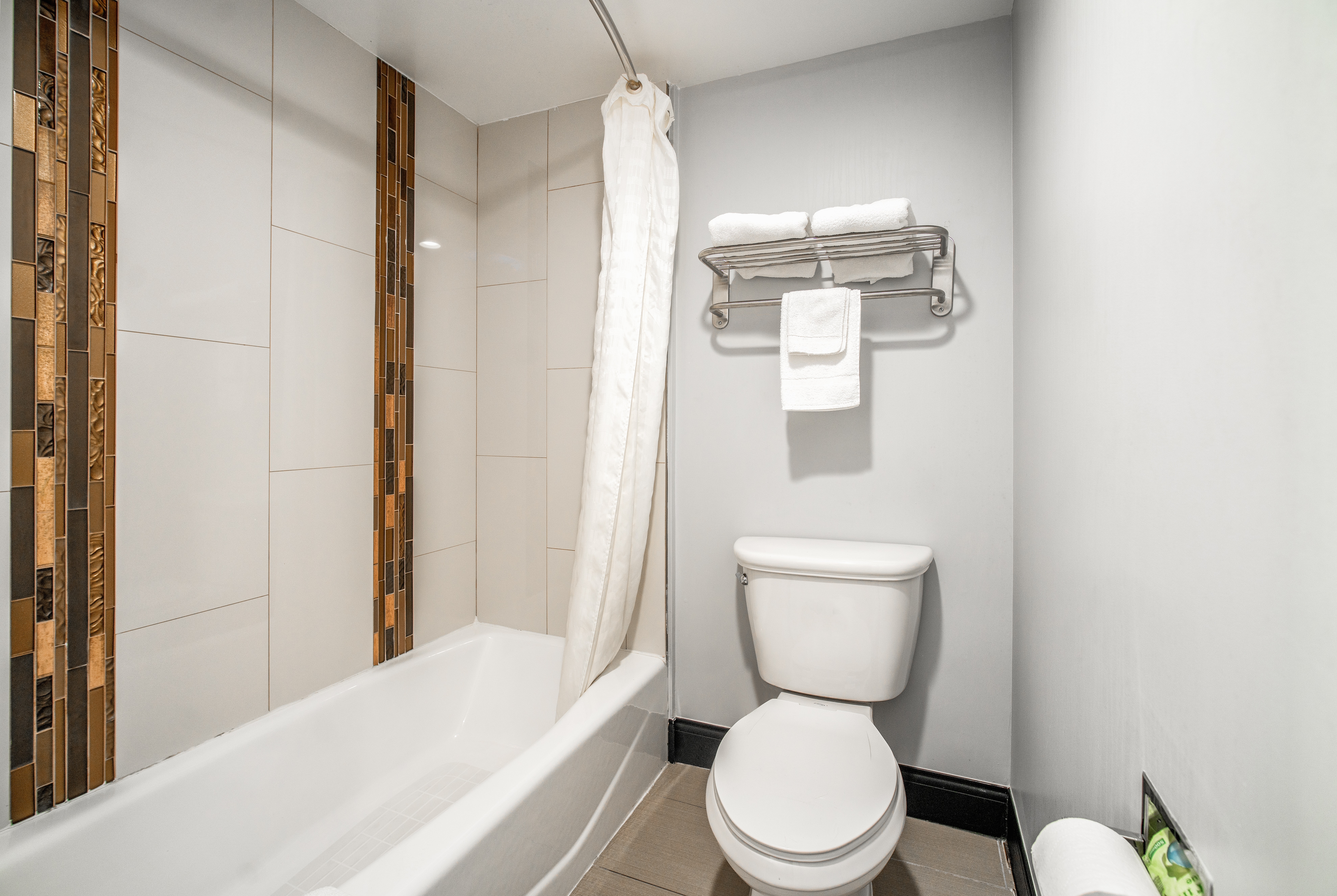 Guest room bath at the Travelodge Inn & Suites by Wyndham Bell Los Angeles Area in Bell, California