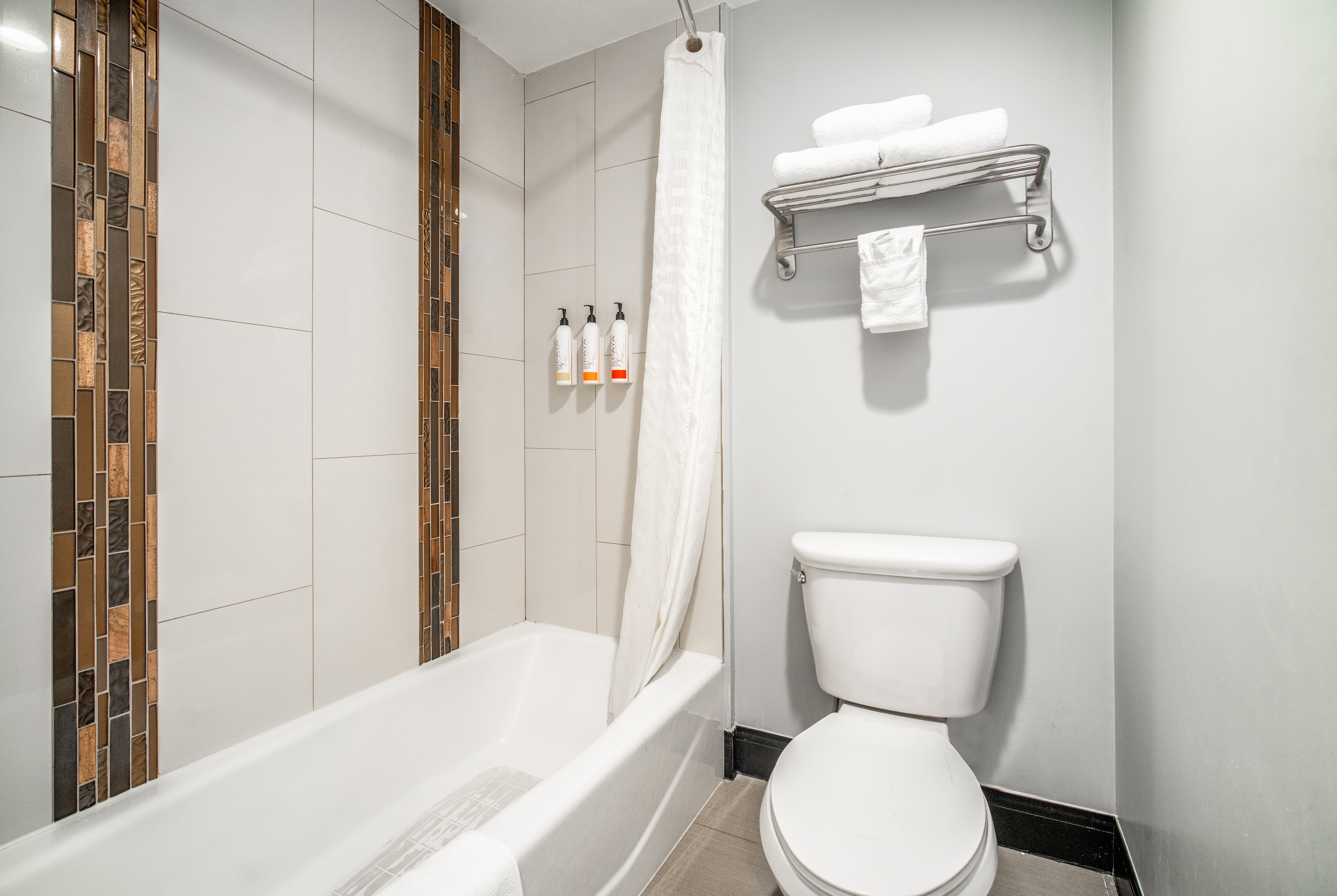 Guest room bath at the Travelodge Inn & Suites by Wyndham Bell Los Angeles Area in Bell, California