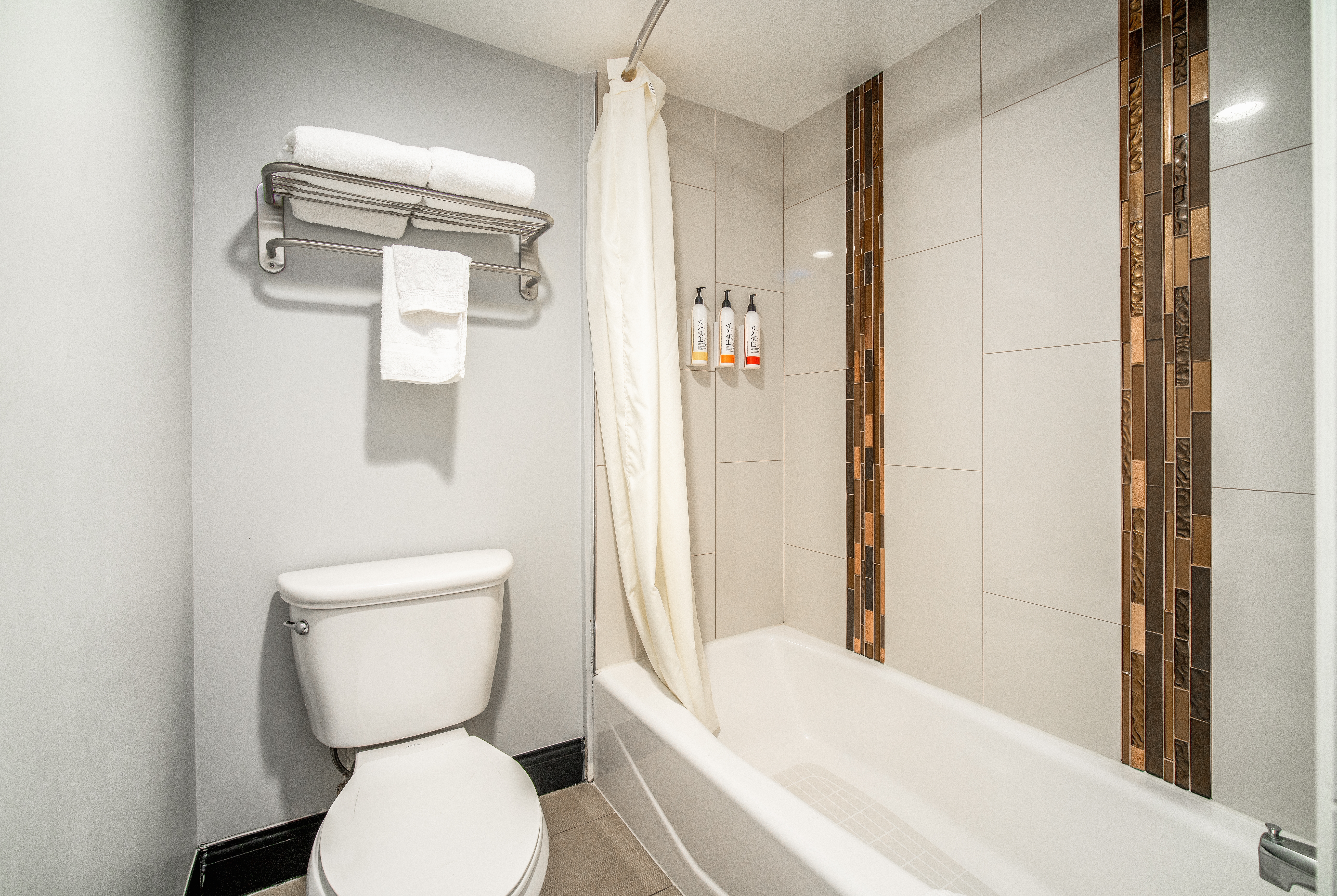 Guest room bath at the Travelodge Inn & Suites by Wyndham Bell Los Angeles Area in Bell, California