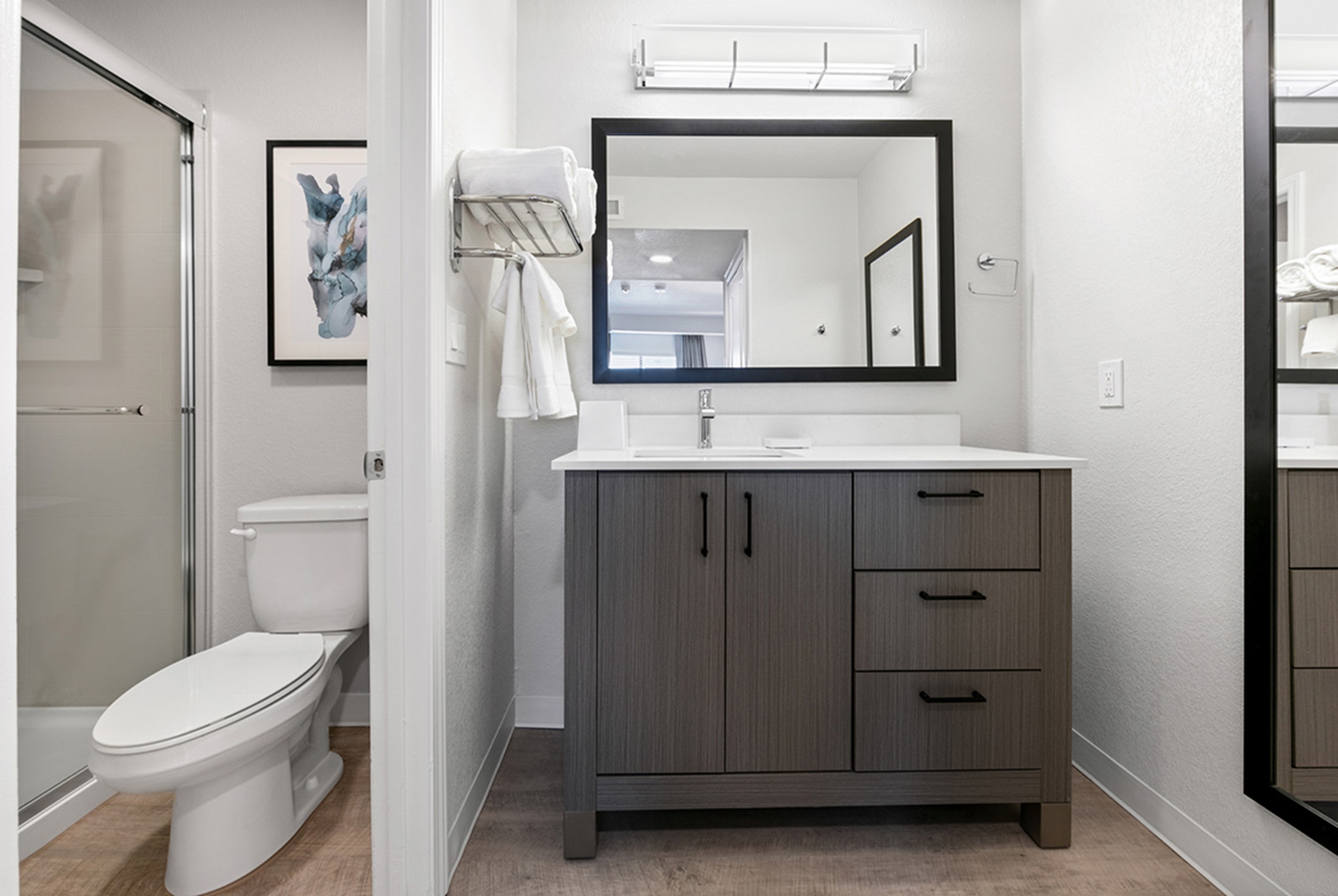 Guest room bath at the WaterWalk Extended Stay by Wyndham Atlanta Perimeter in Atlanta, Georgia