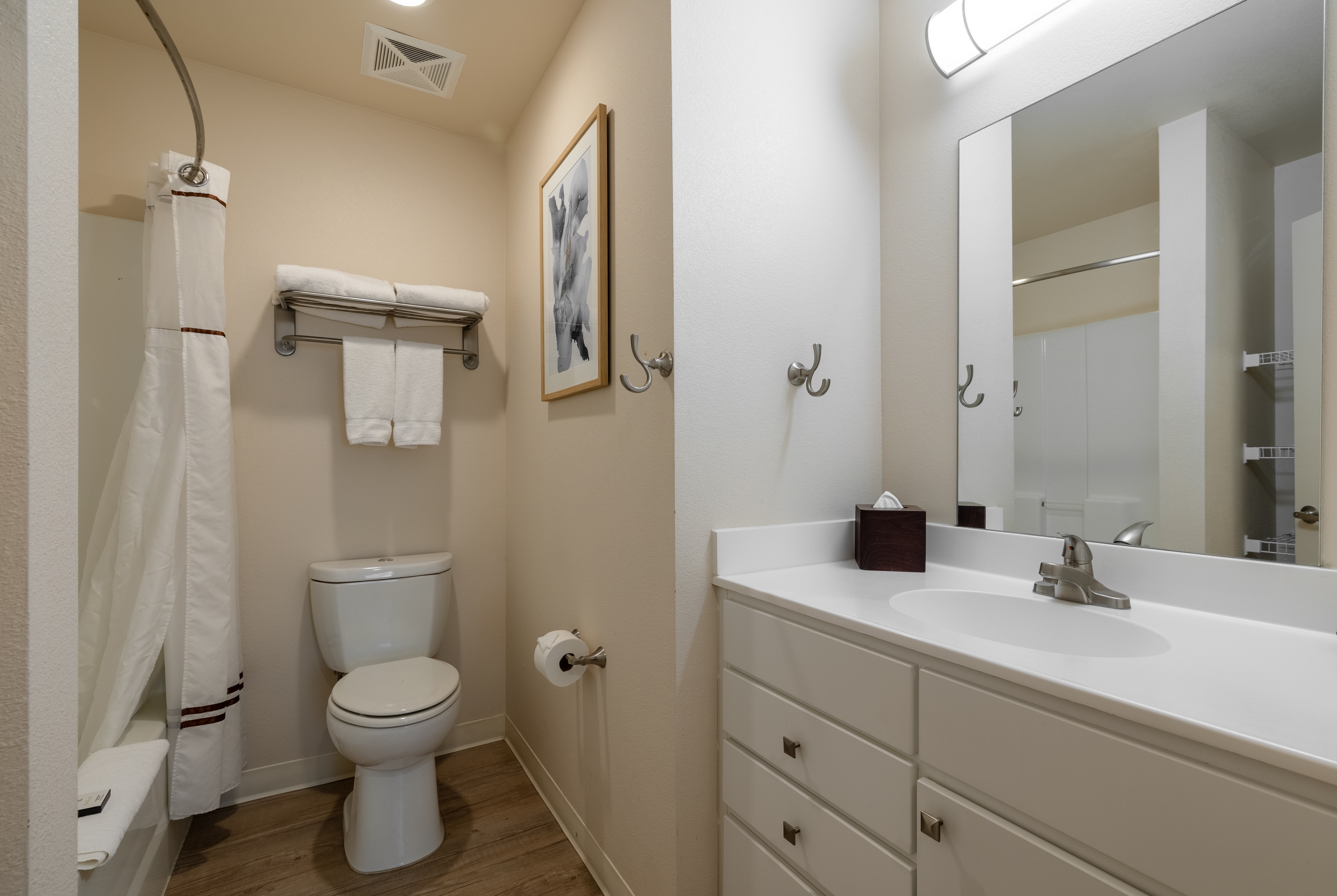 Guest room bath at the WaterWalk Extended Stay Wichita in Wichita, Kansas