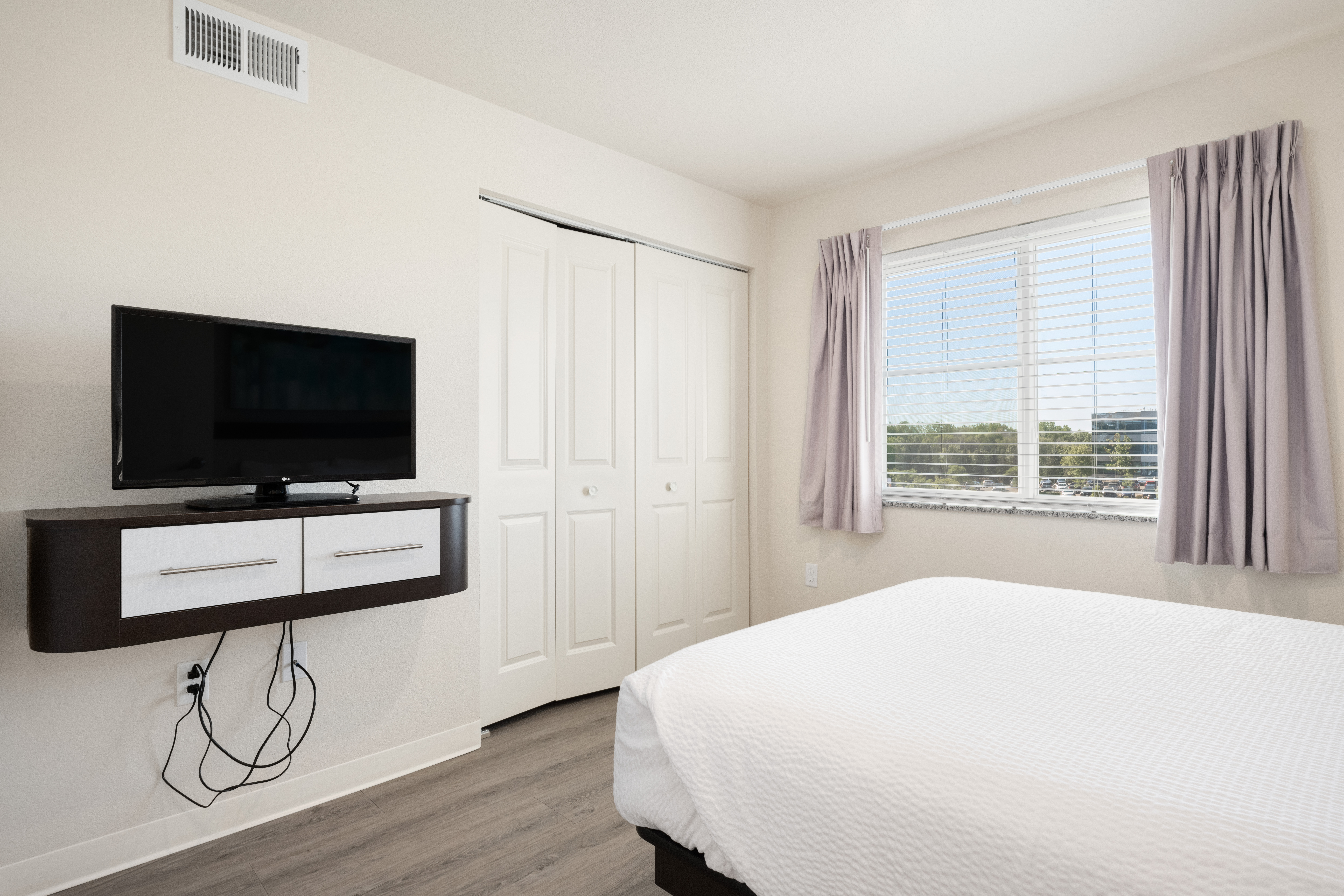 Guest room at the WaterWalk Extended Stay Minneapolis - Plymouth in Plymouth, Minnesota