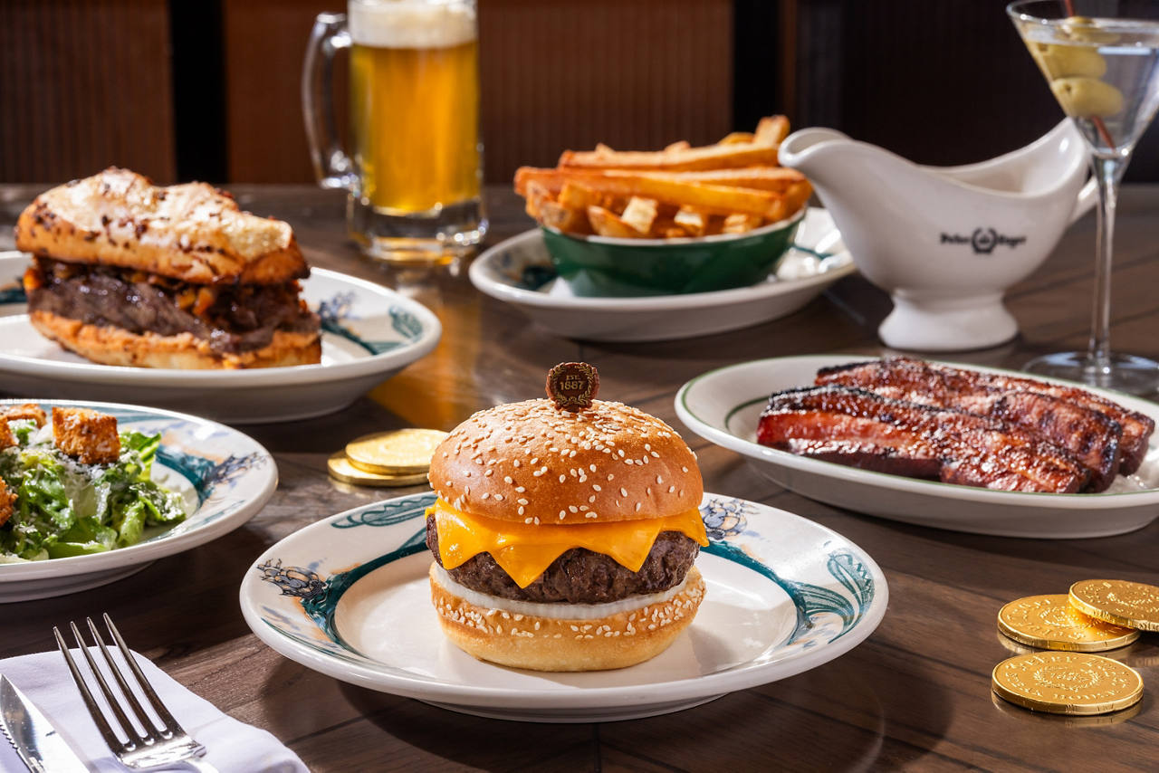 Food options on a table at Peter Luger Steak House at Caesars Palace in Las Vegas, NV.  Shot July 2024.