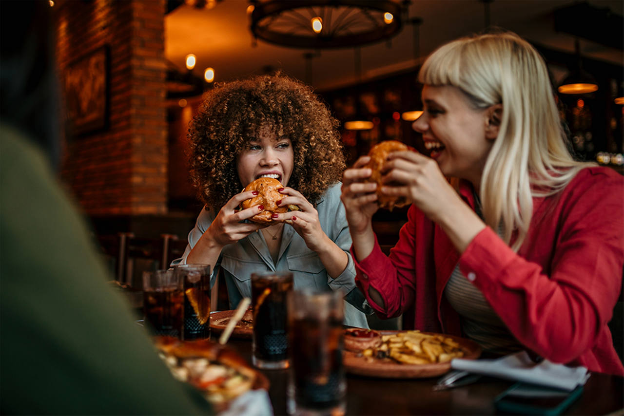 Two women enjoying a meal