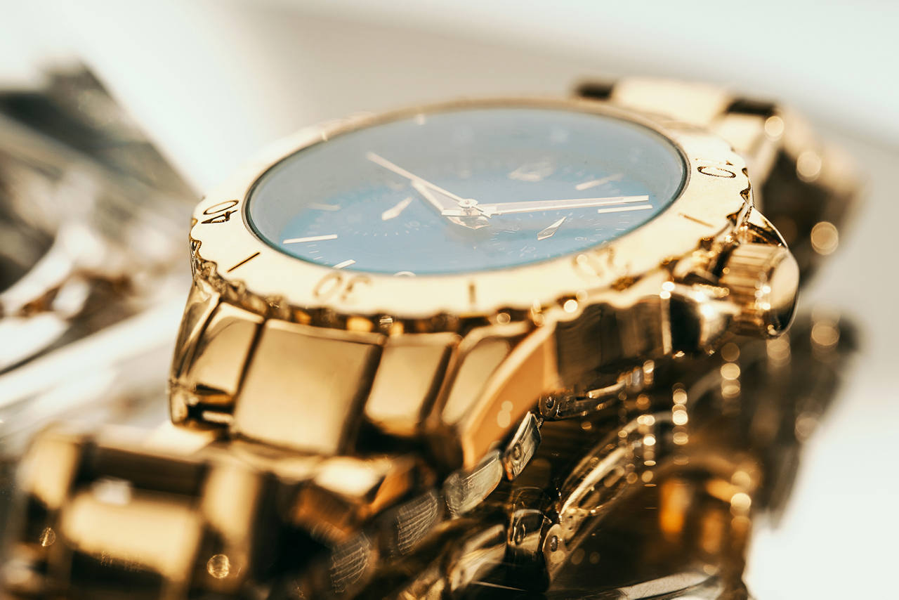 An expensive gold watch.